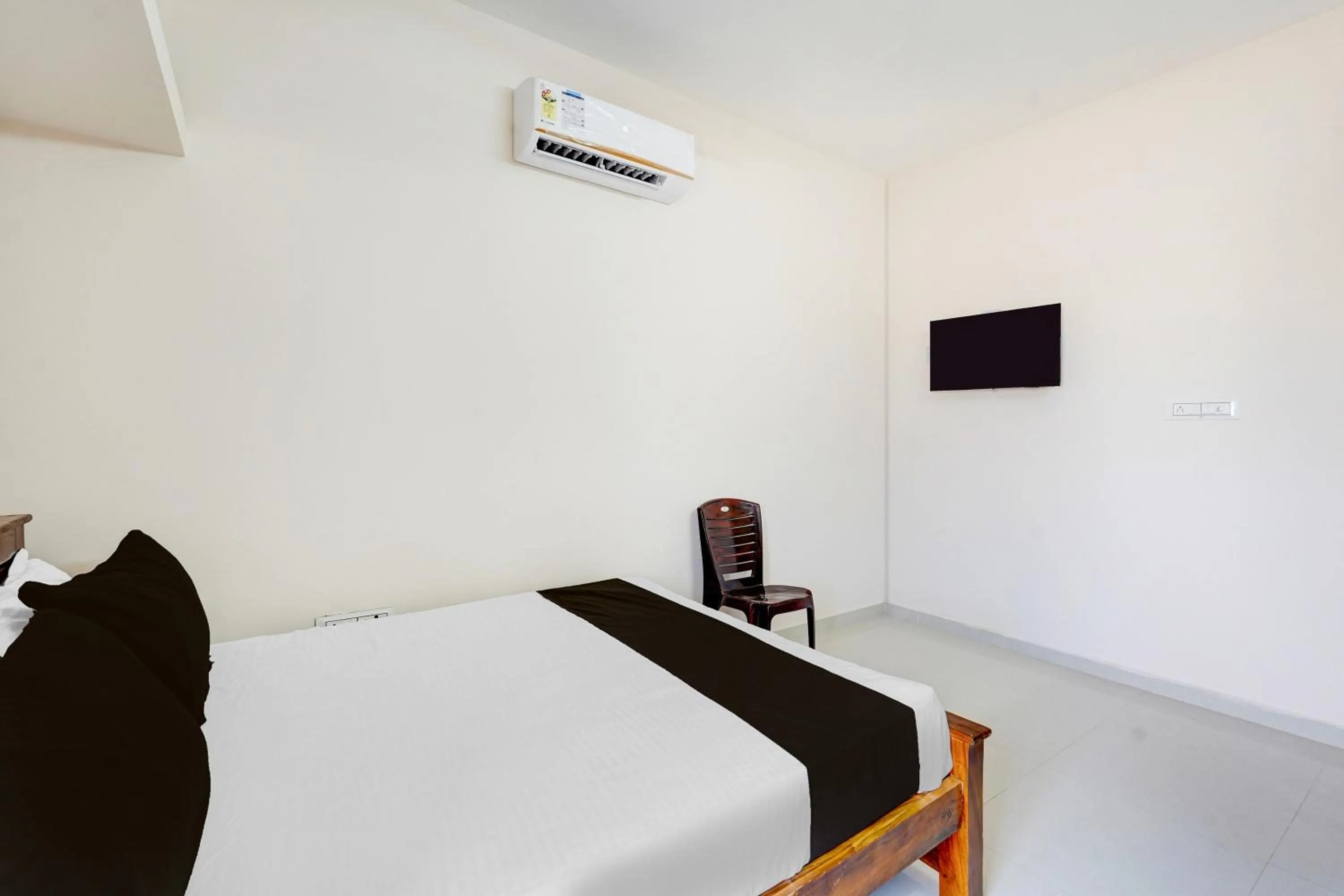 Bedroom in Super Collection O Sholinganallur Chennai Formerly Nimalan Residenc