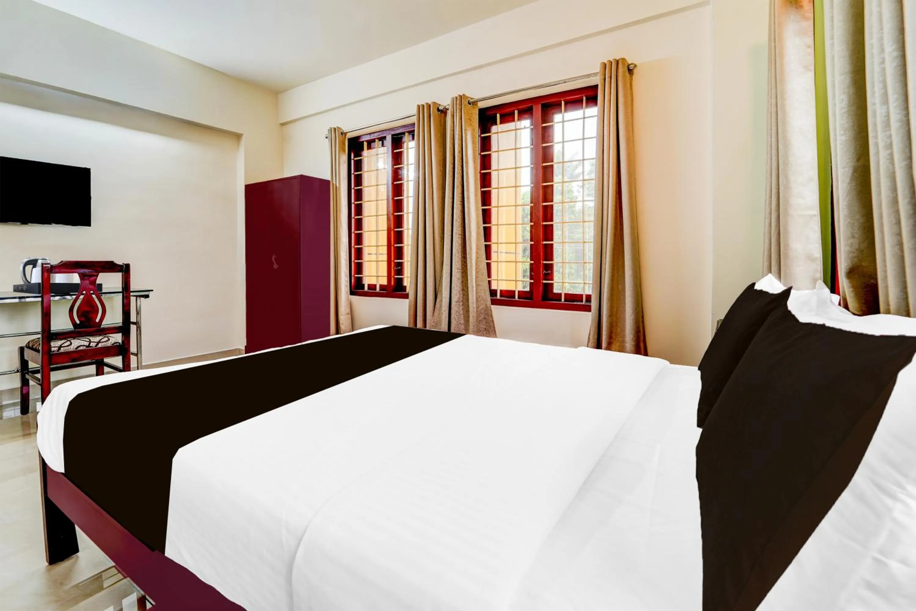Bed in Super Collection O Kottayam Formerly Sap Inn