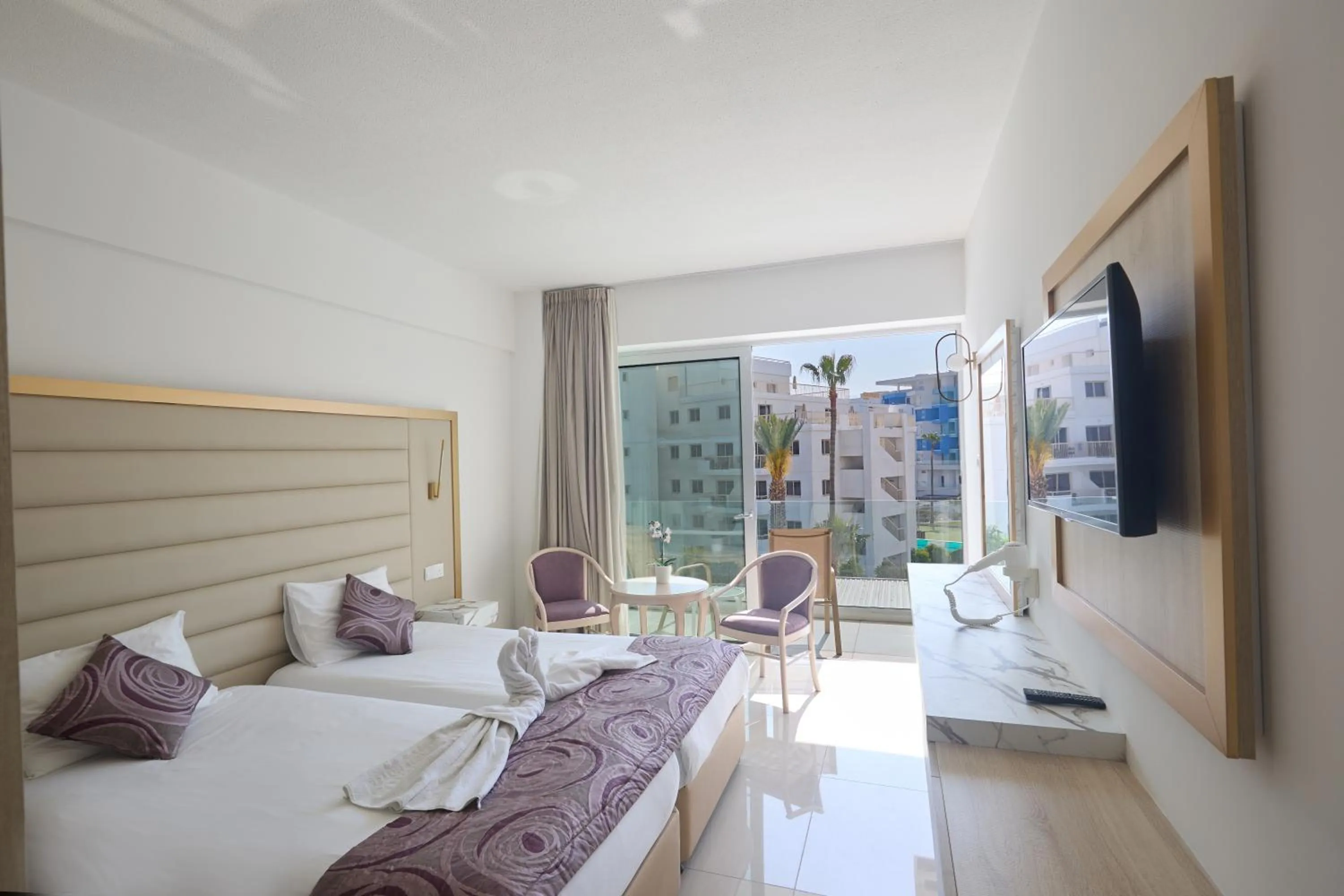 Bed in Tsokkos Protaras Beach Hotel