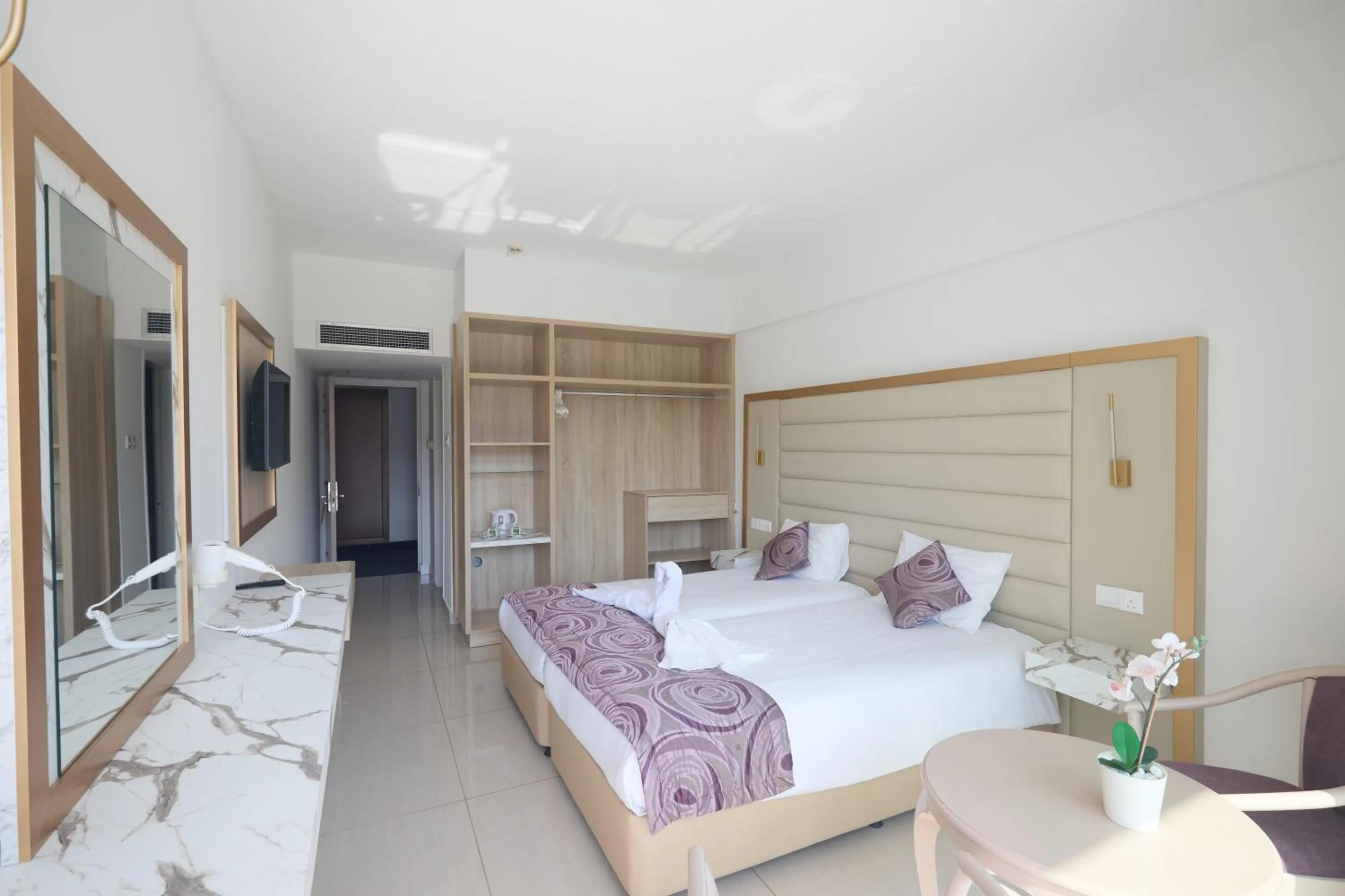 Bed in Tsokkos Protaras Beach Hotel