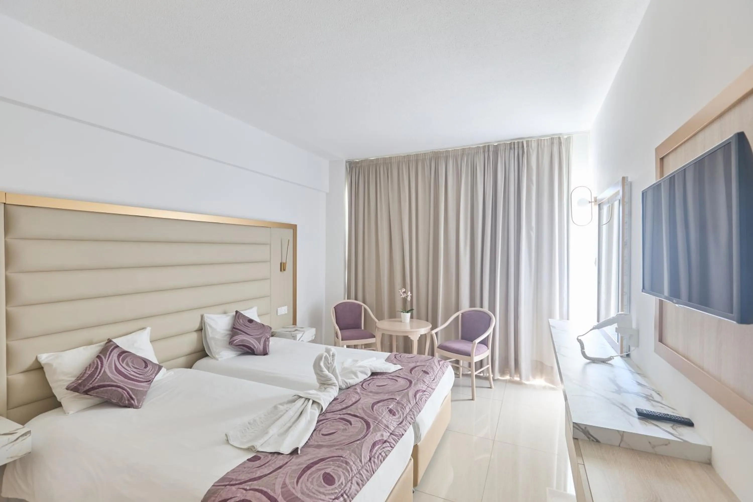 Bed in Tsokkos Protaras Beach Hotel