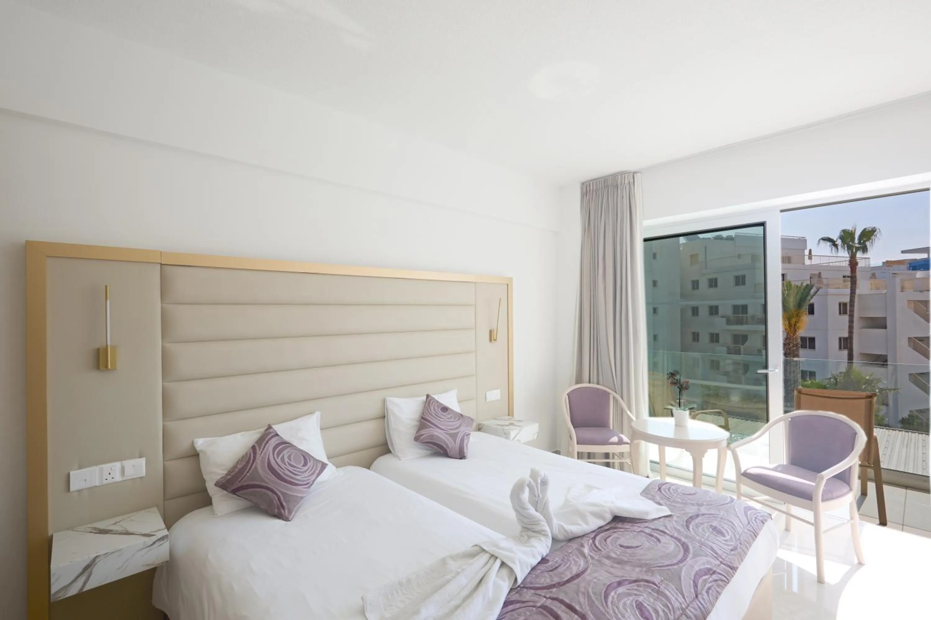 Bed in Tsokkos Protaras Beach Hotel