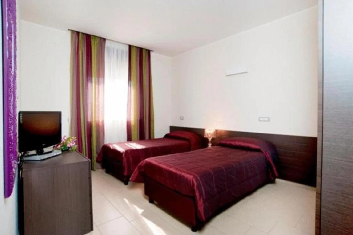 Bed in Hotel Massimino