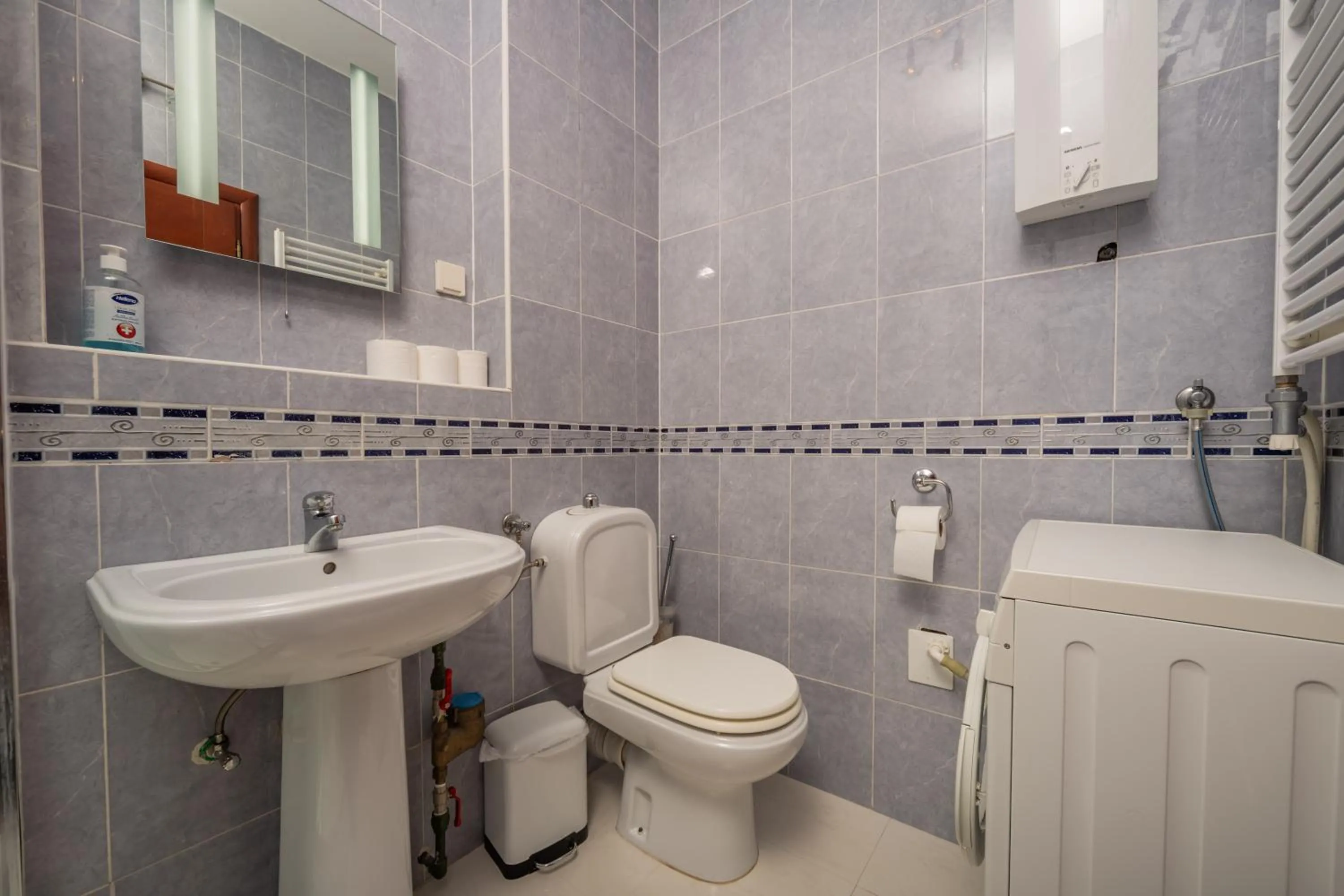 Toilet in City Apartments