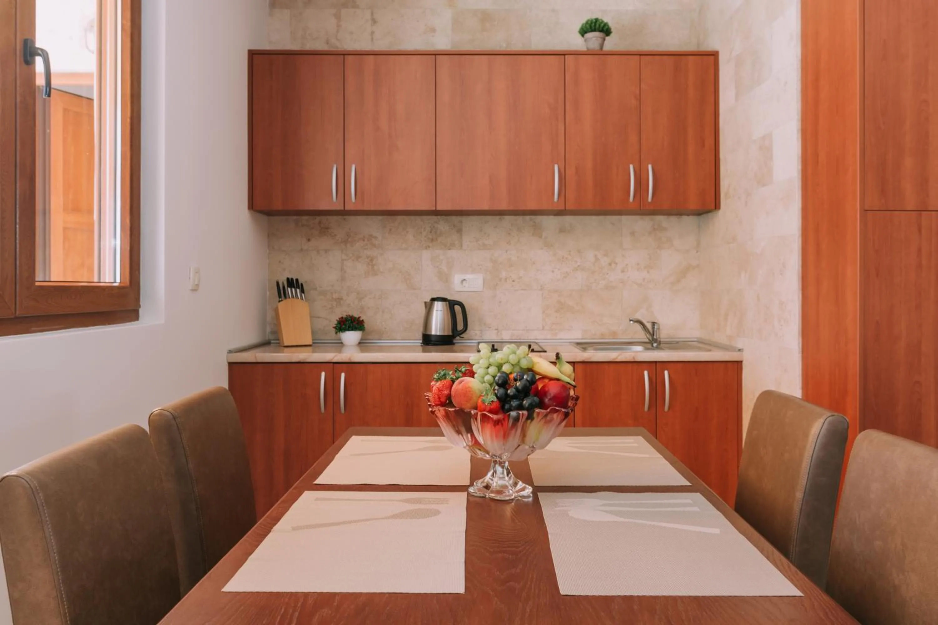 Kitchen or kitchenette in City Apartments