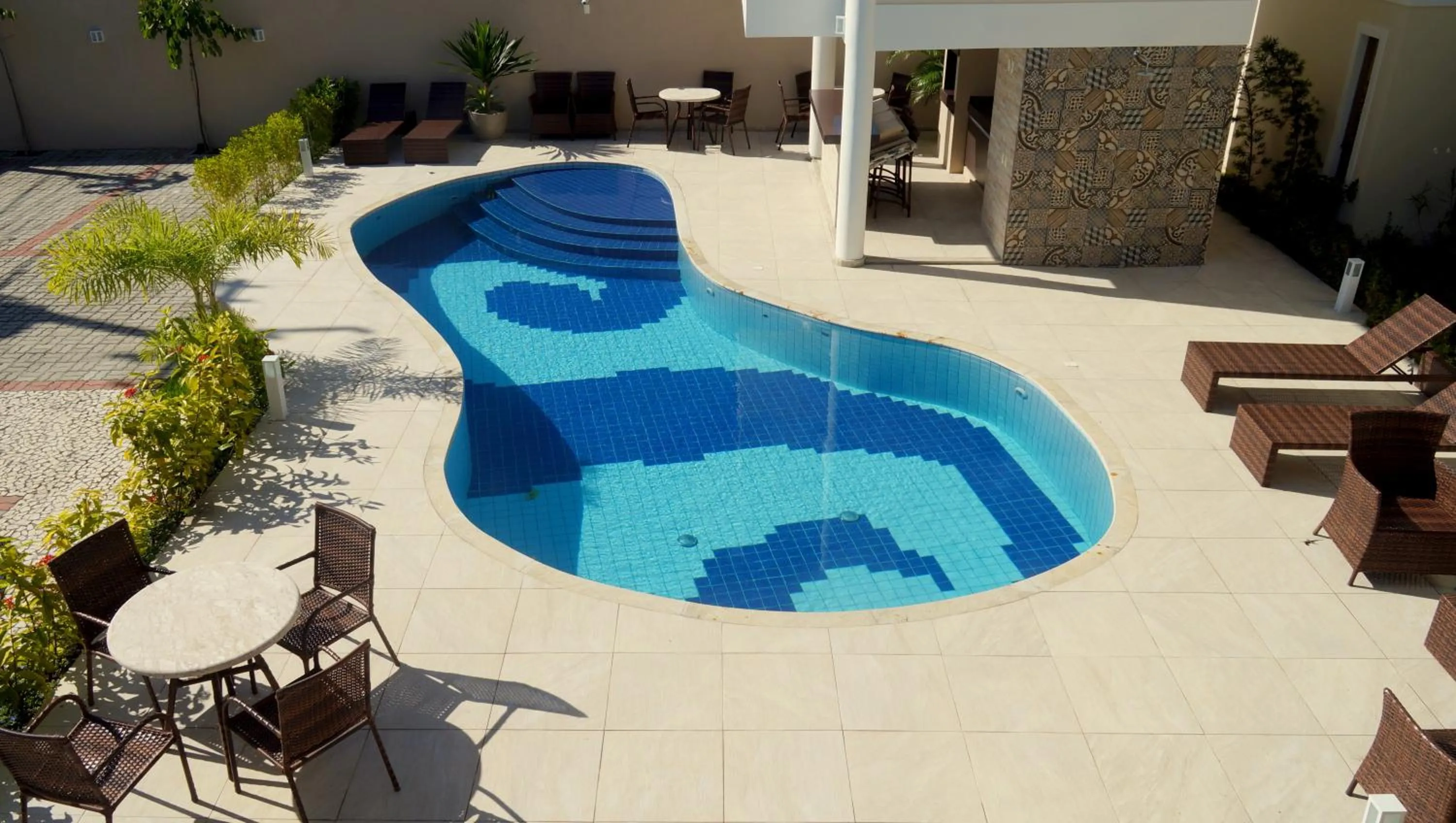 Swimming pool in Residencial Portinari LTDA