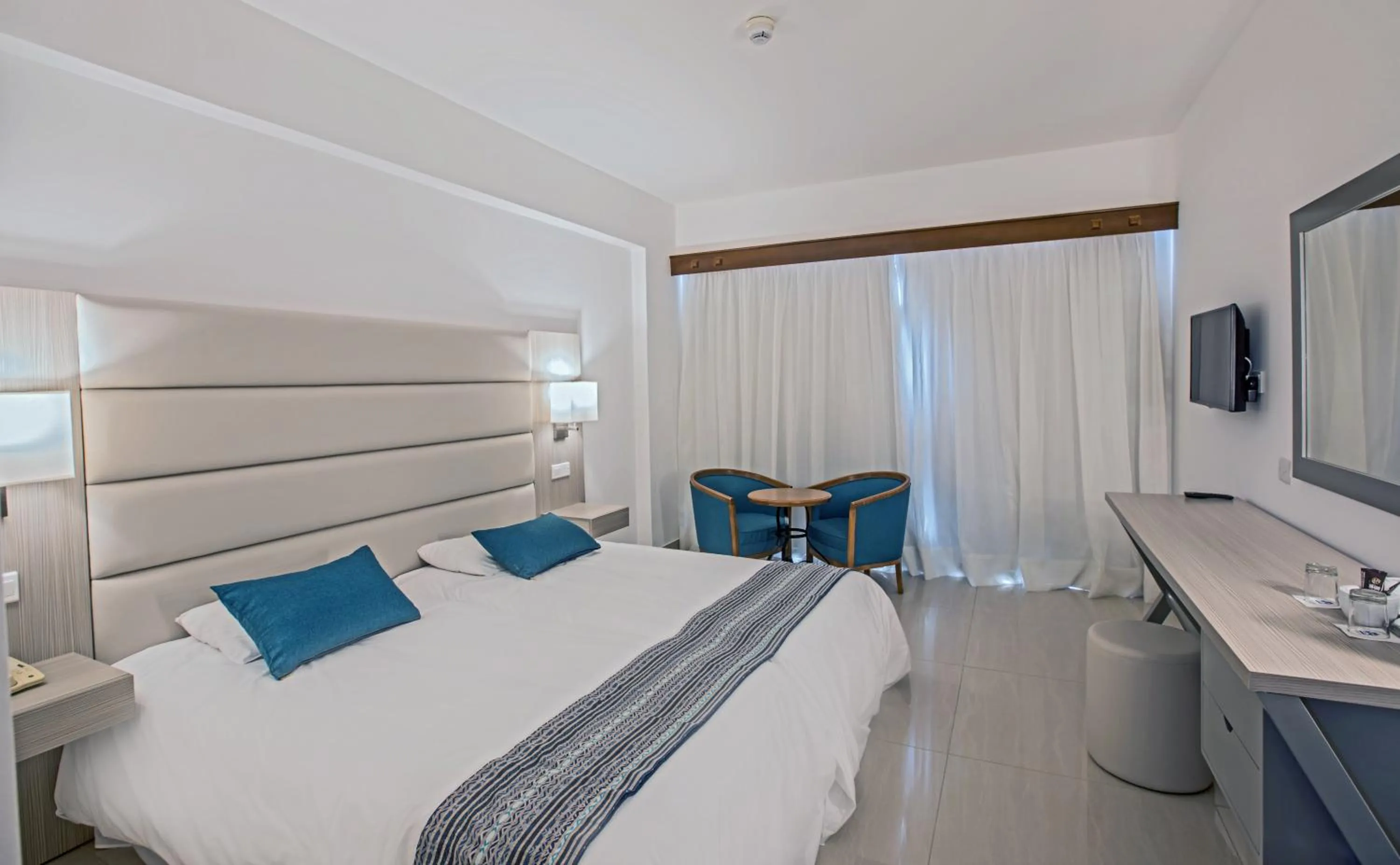 Bed in Anmaria Beach Hotel & Spa