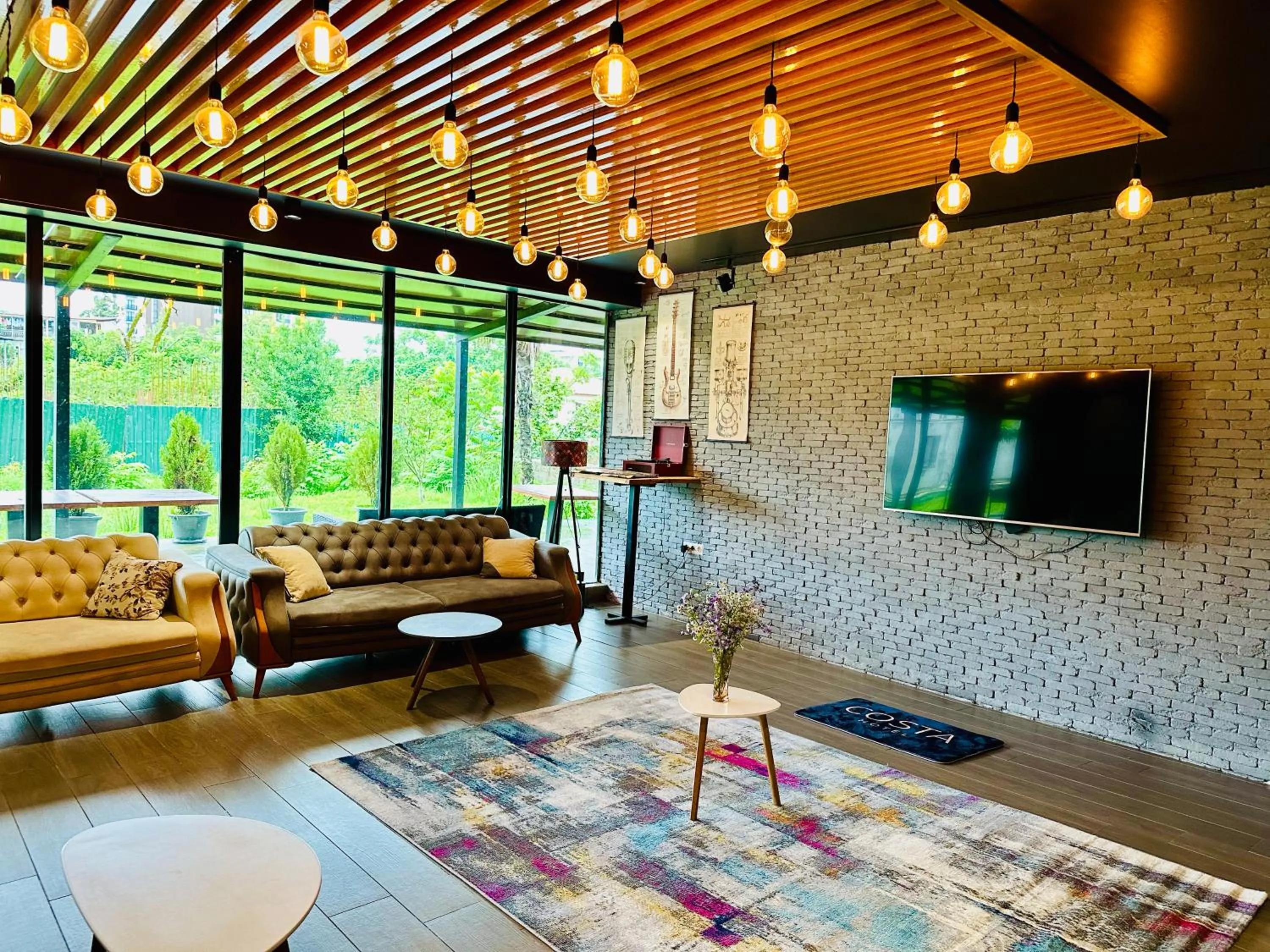 Communal lounge/ TV room in Aparthotel costa