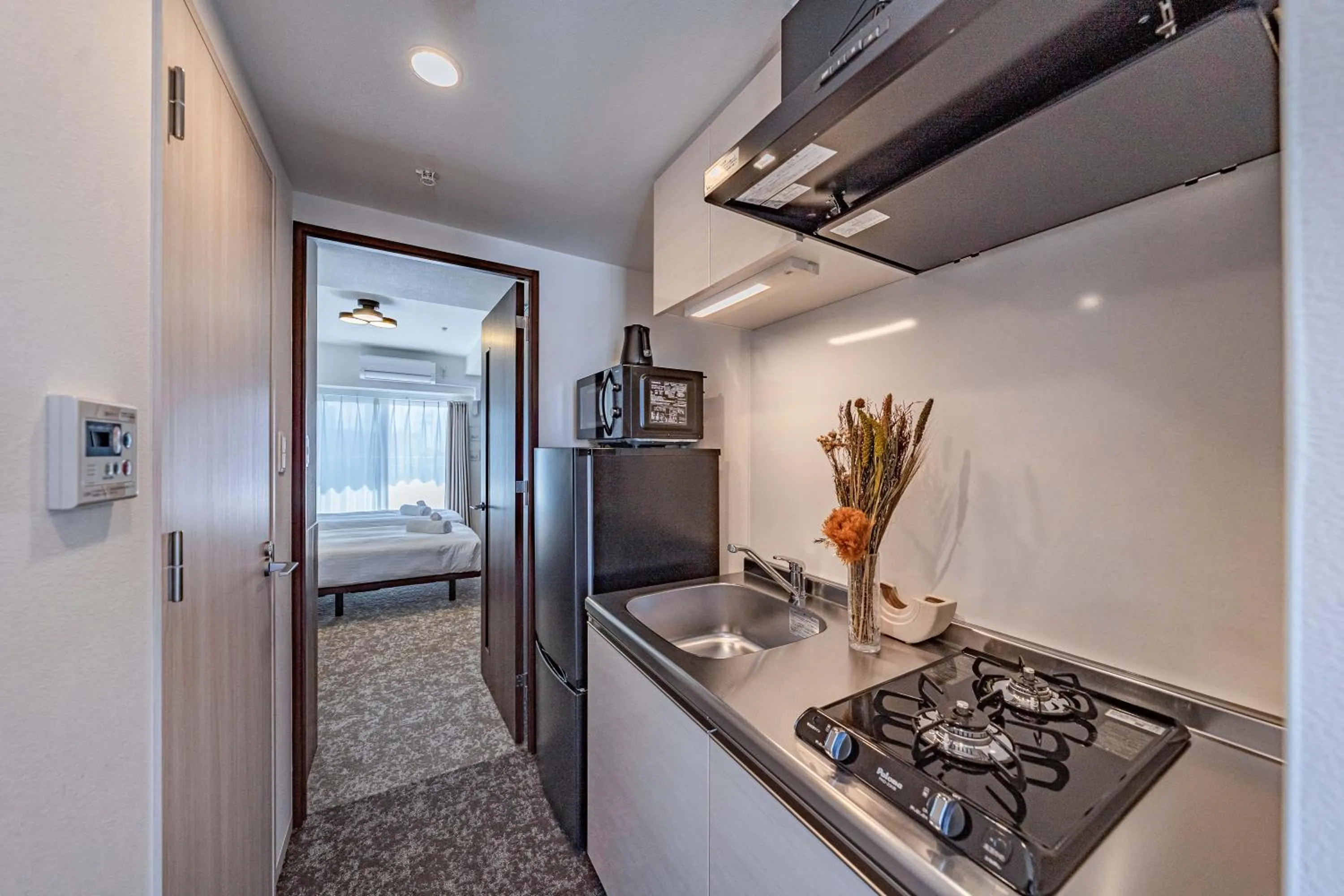 Kitchen or kitchenette in Apartment Hotel 11 Osaka Dome