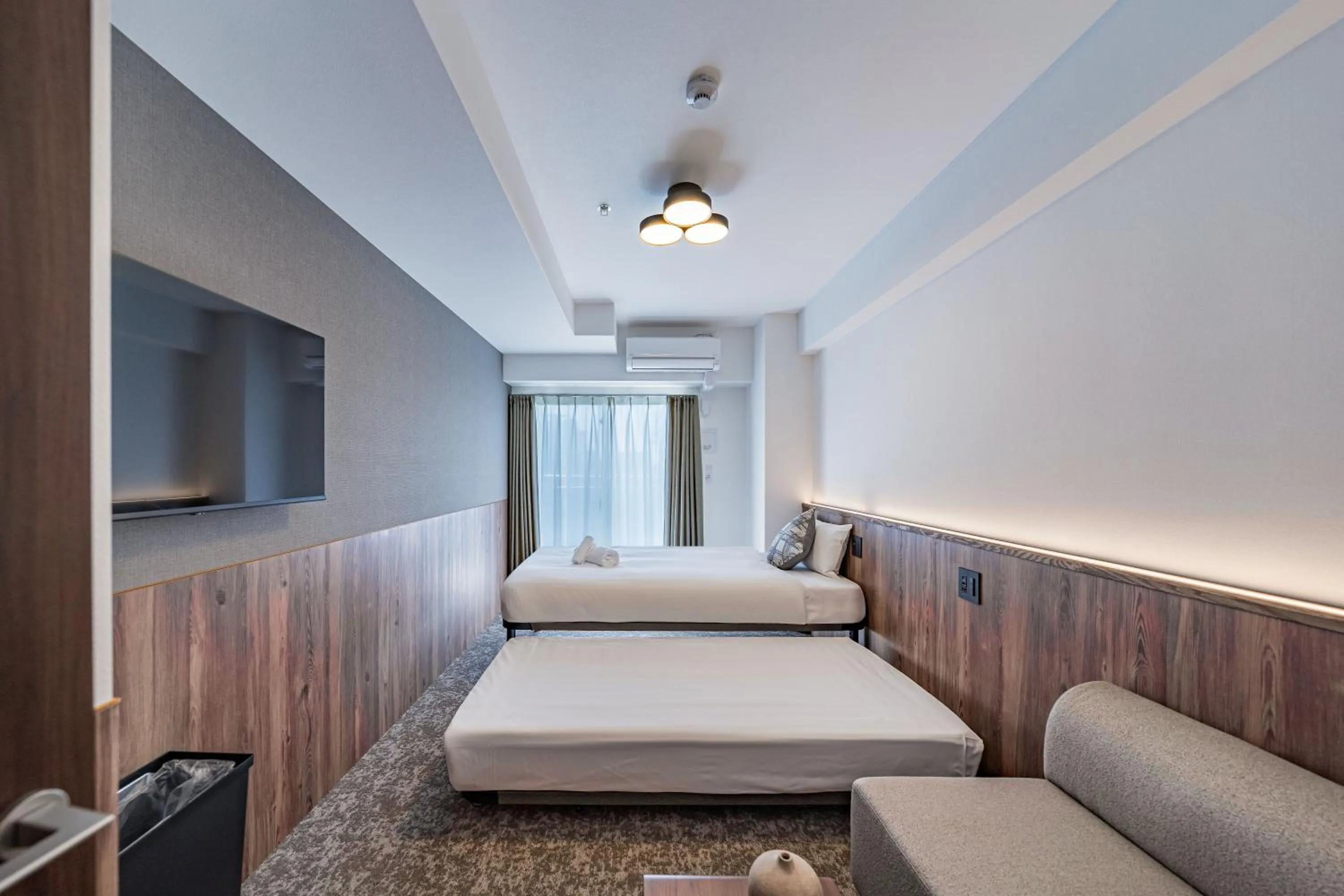 Bed in Apartment Hotel 11 Osaka Dome