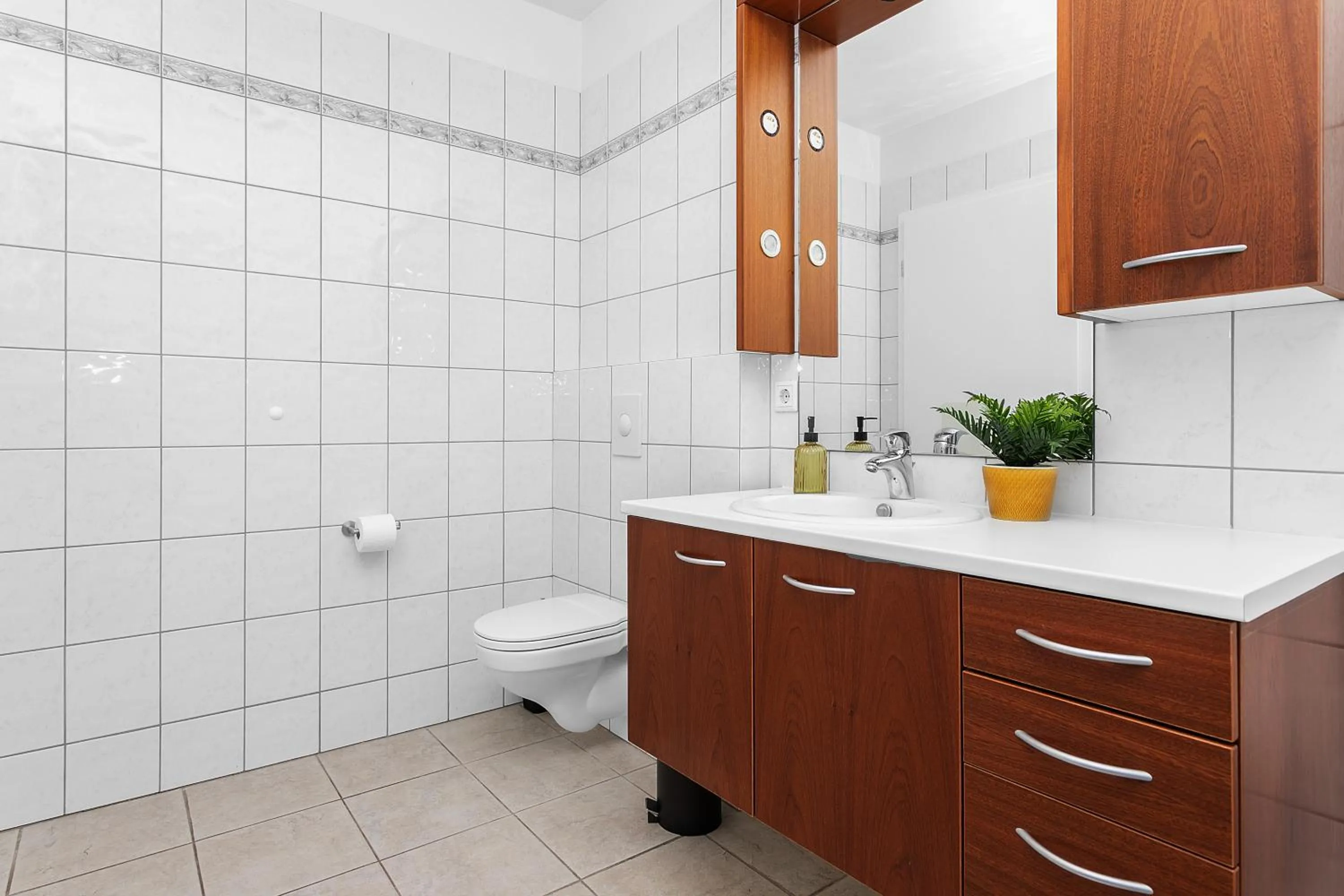 Toilet in Bella Apartments & Rooms