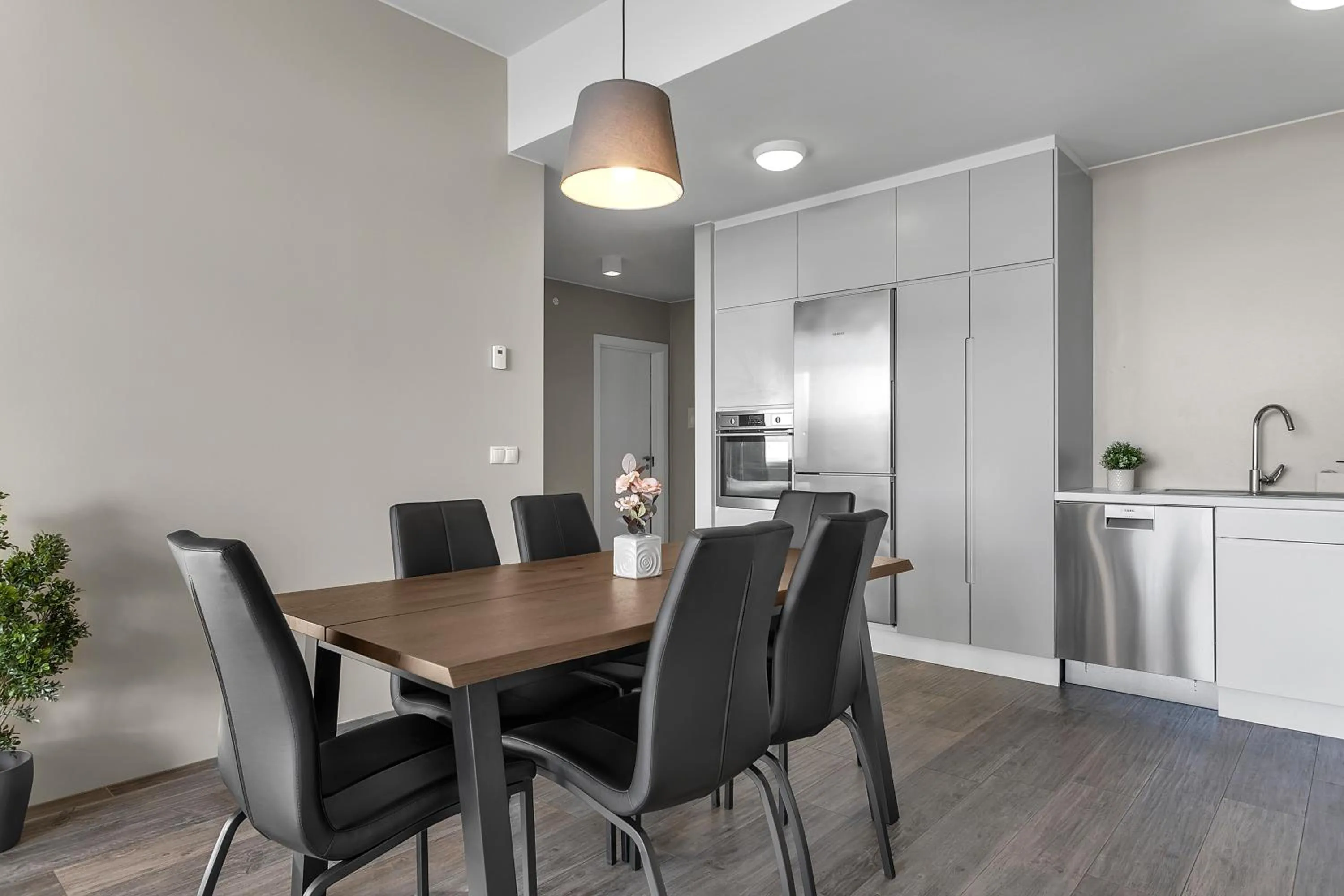 Kitchen or kitchenette in Bella Apartments & Rooms