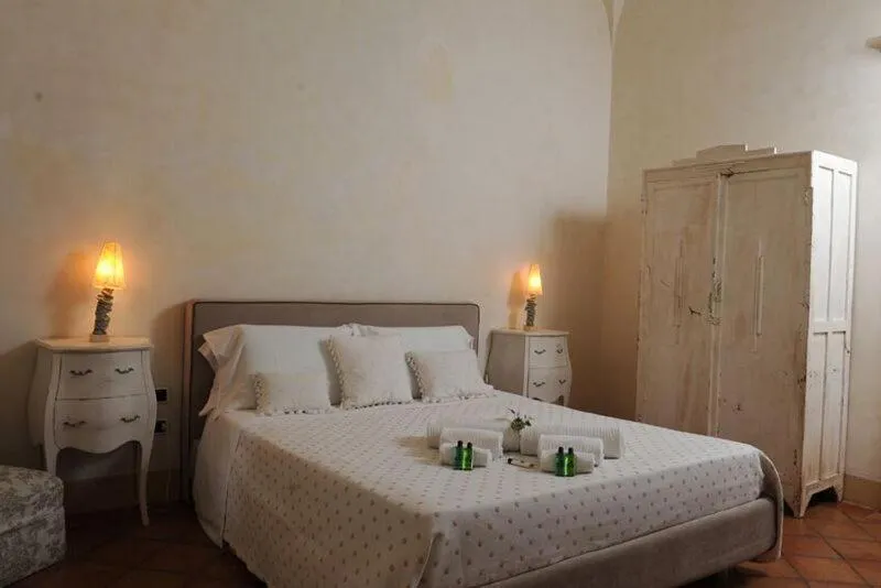 Bedroom in Casa Raiola Ercolano Luxury Rooms & Spa
