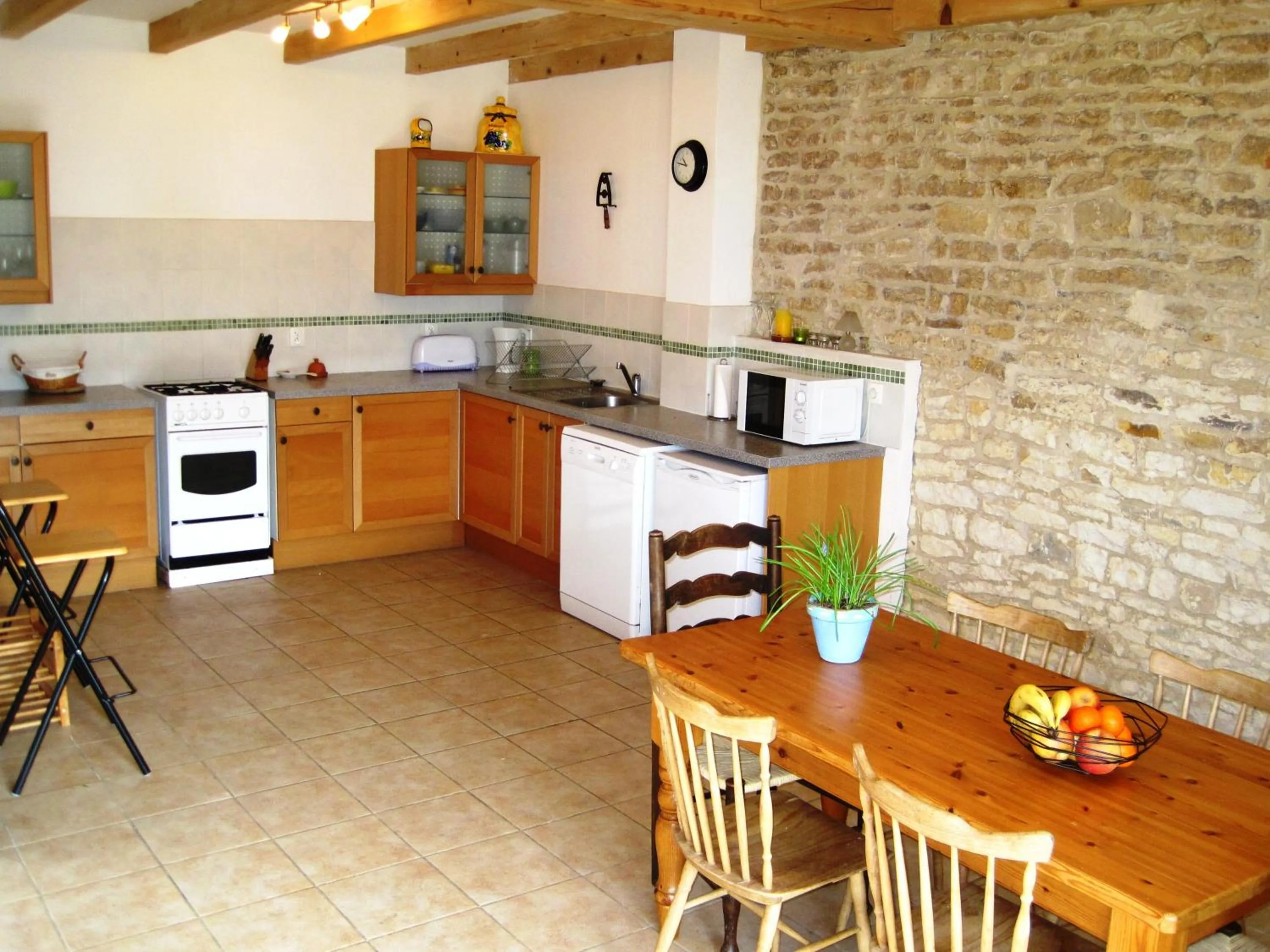 Kitchen or kitchenette in Le Noisetier at Les Hiboux Gites
