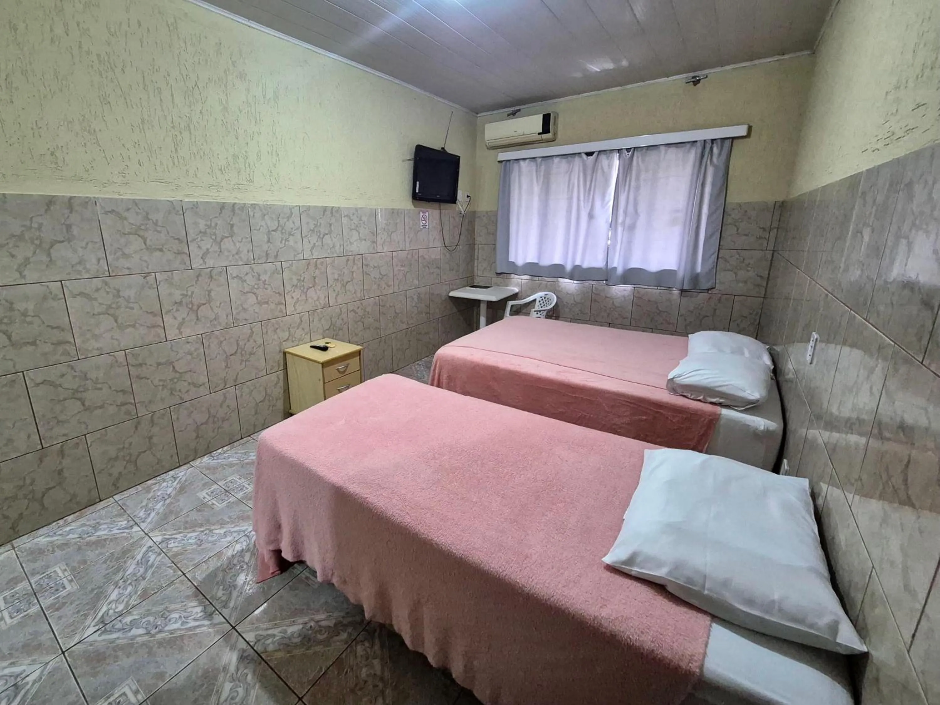 Bed in Yves Hotel