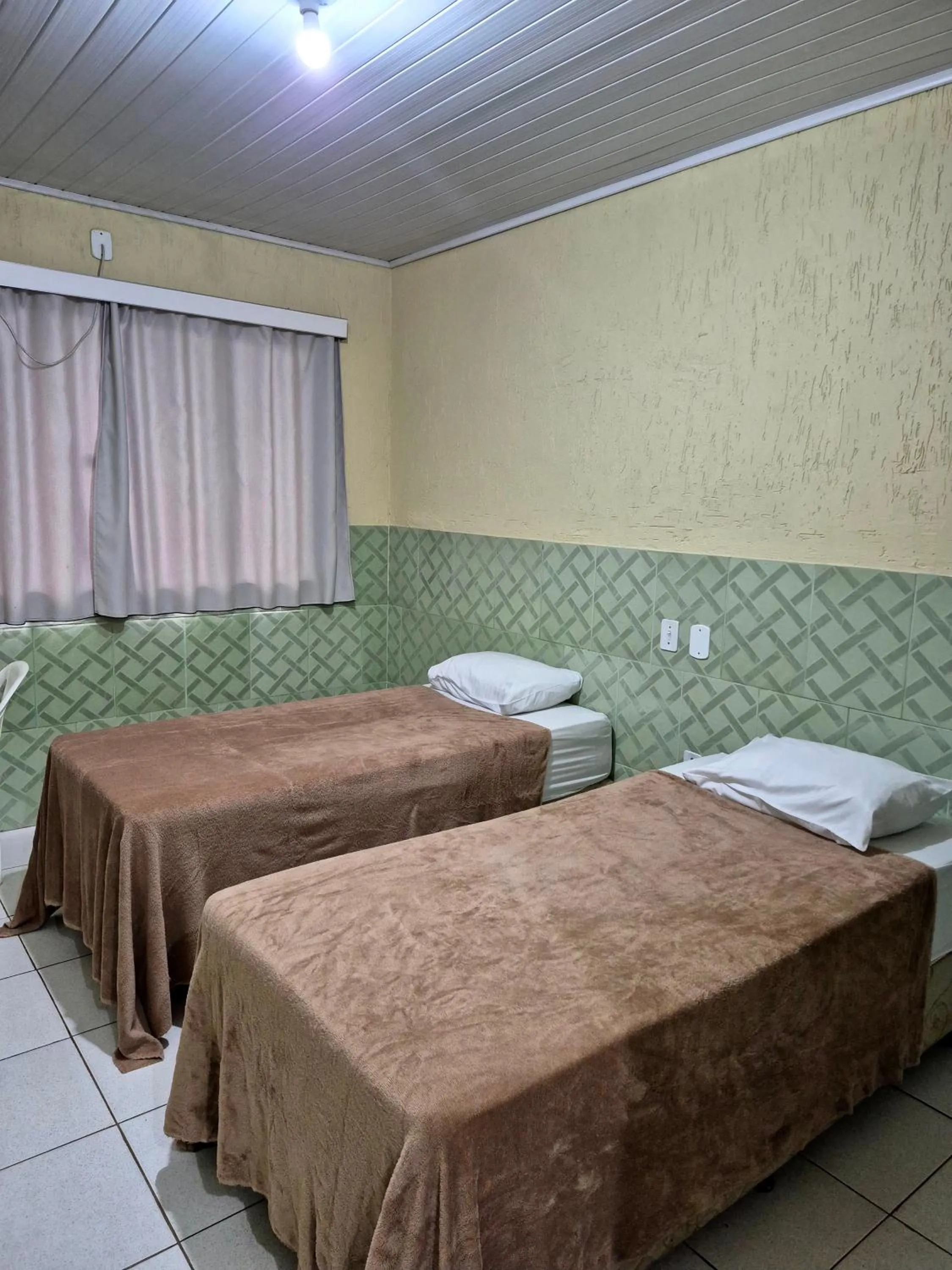 Bed in Yves Hotel