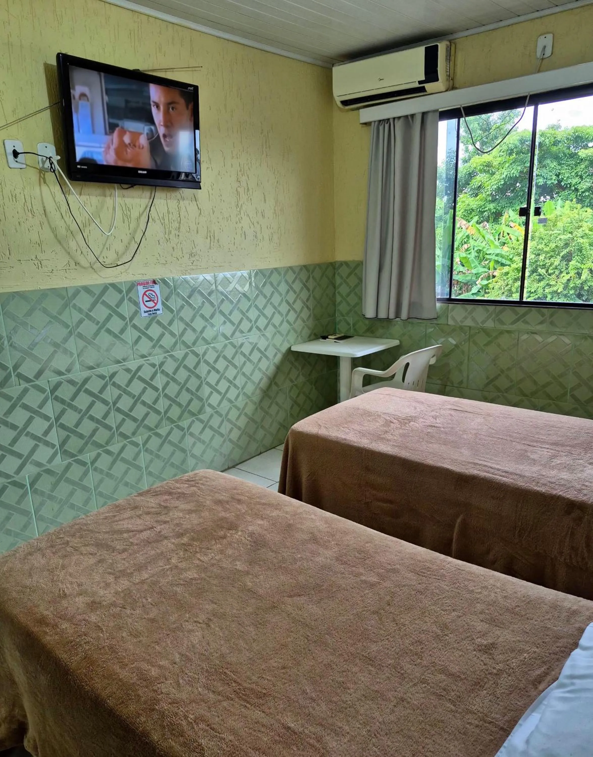 Bed in Yves Hotel