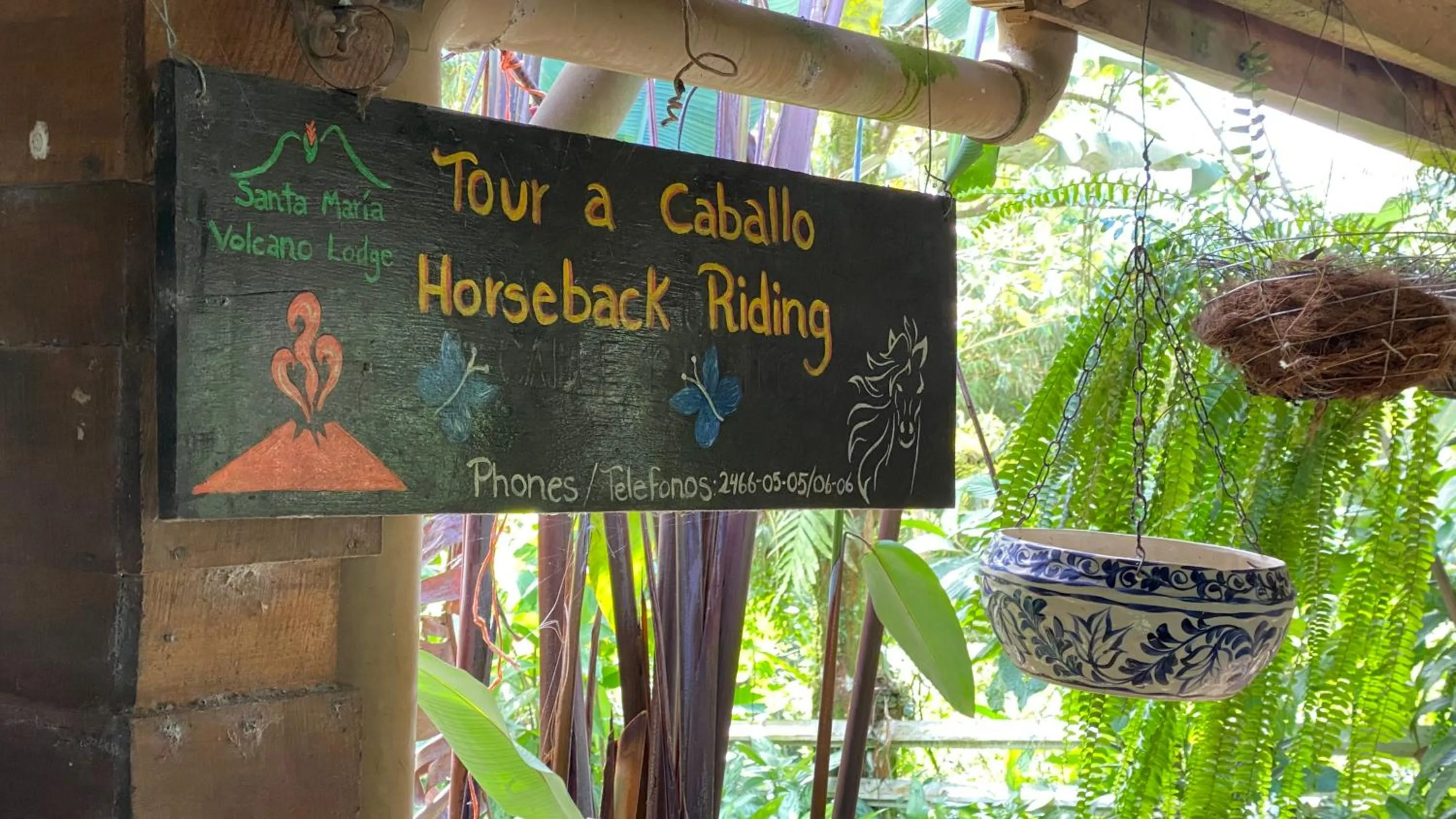 Property logo or sign in Santa Maria Volcano Lodge Hotel & Restaurante