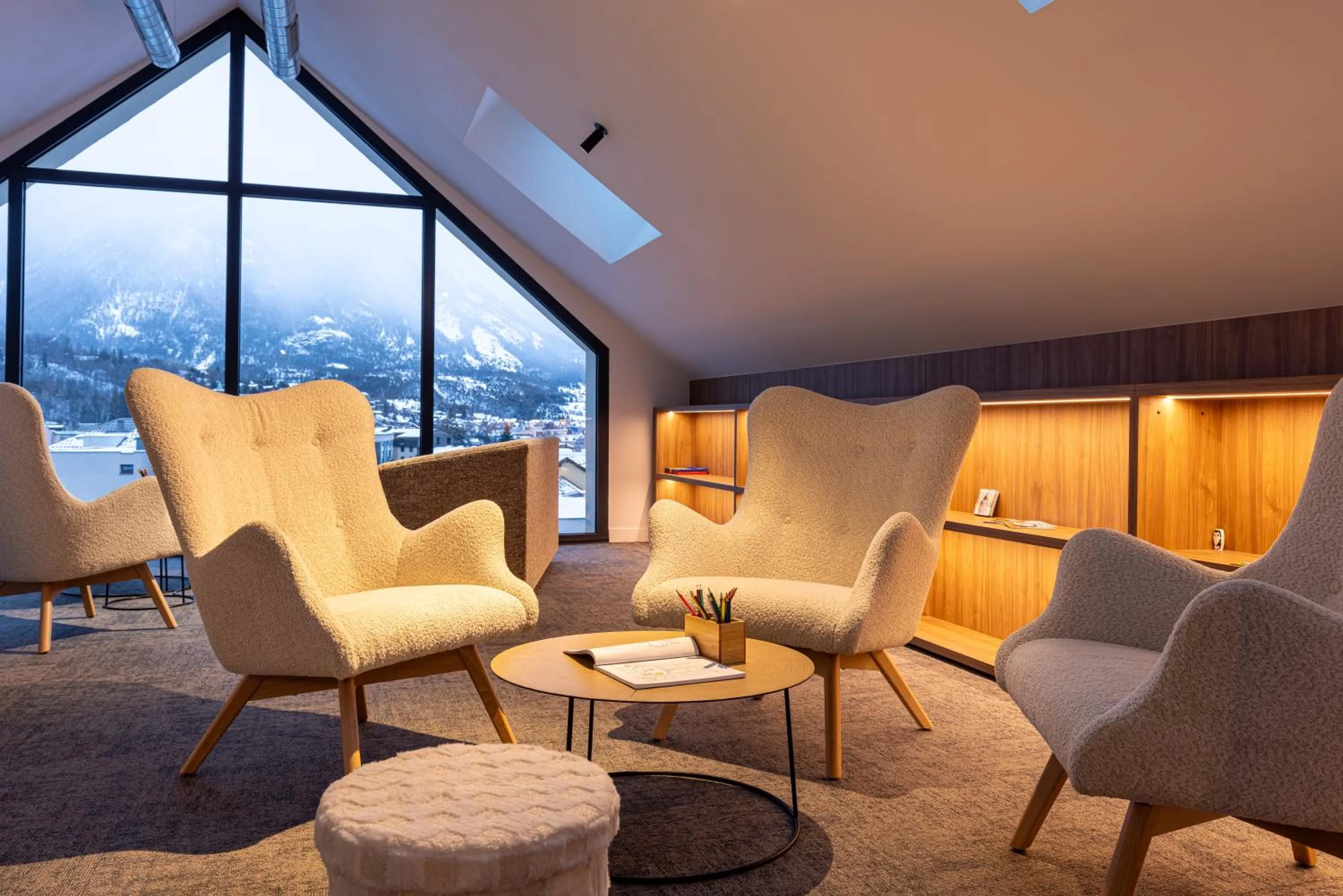Seating area in Garrigae Caserne de Briançon & SPA Cinq Mondes