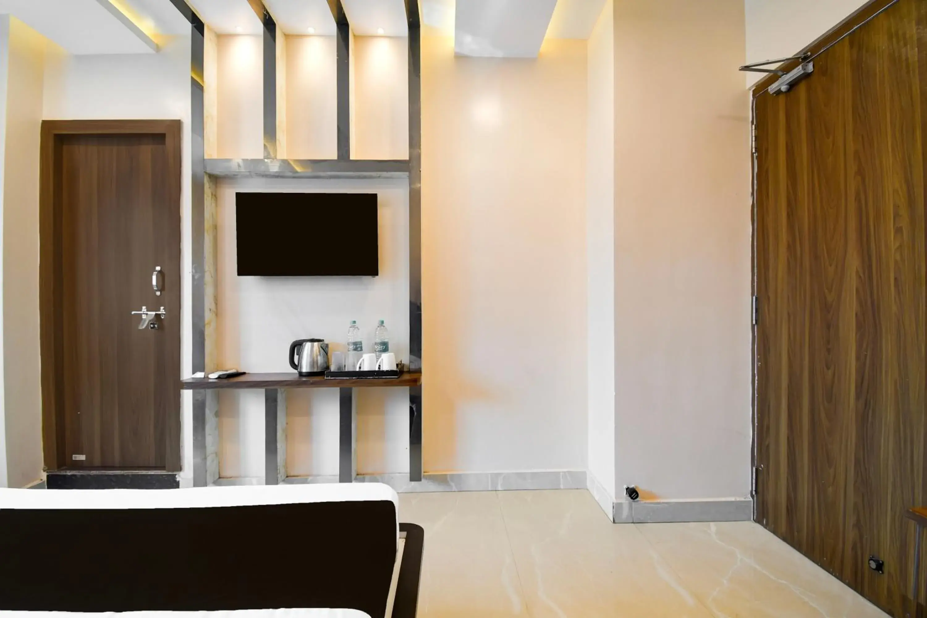 Bedroom in Super Townhouse Puri Formerly Hotel Narashingha Bedroom in Super Townhouse Puri Formerly Hotel Narashingha