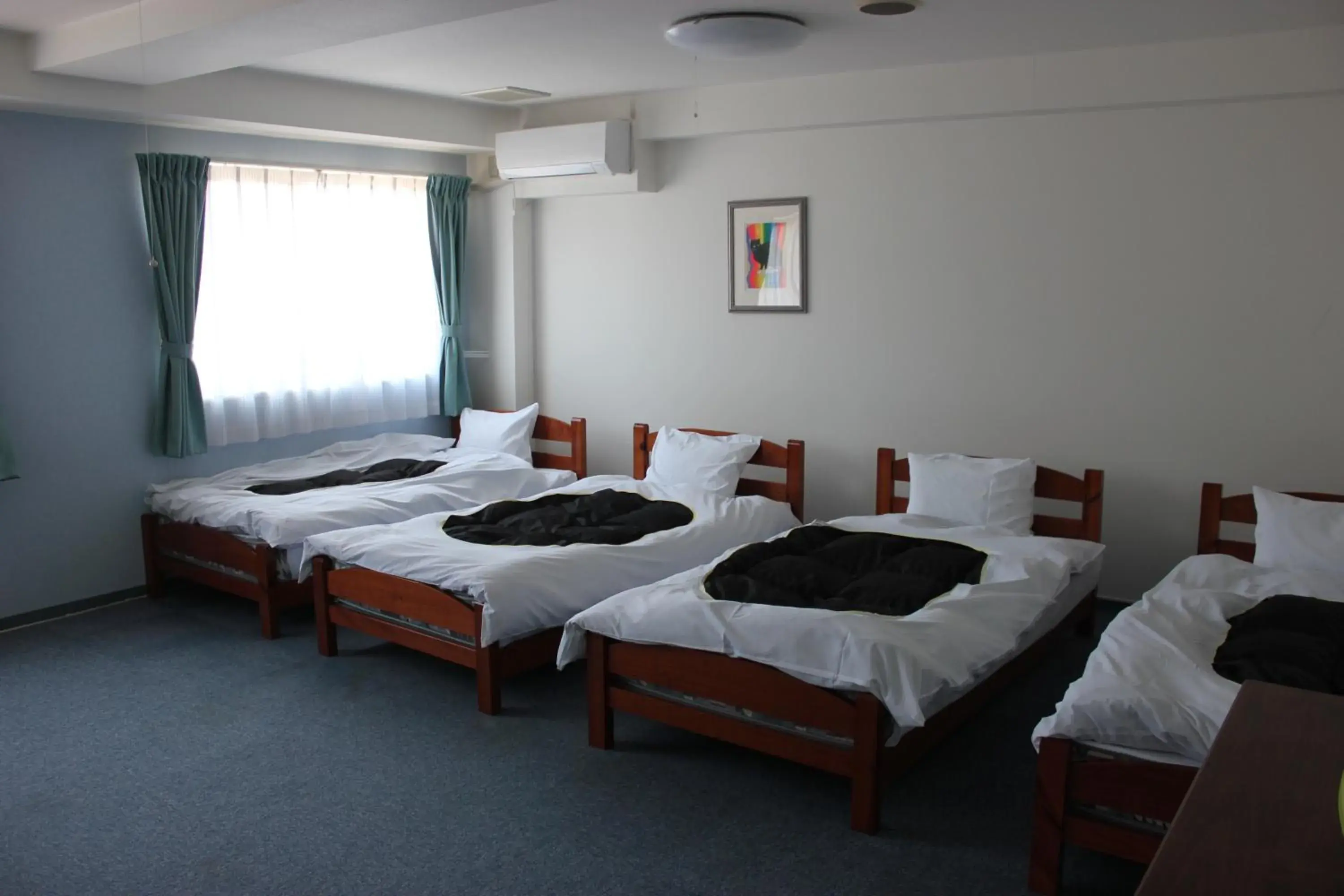 Bed in Grampus Inn Shirahama Bed in Grampus Inn Shirahama