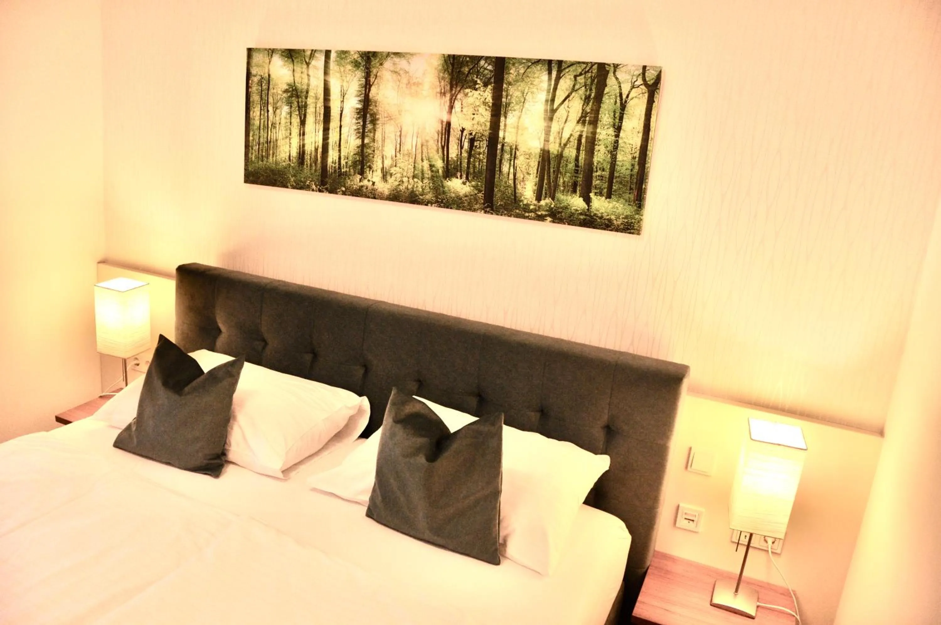 Bed in Home Sweet Apartments - A cozy welcome