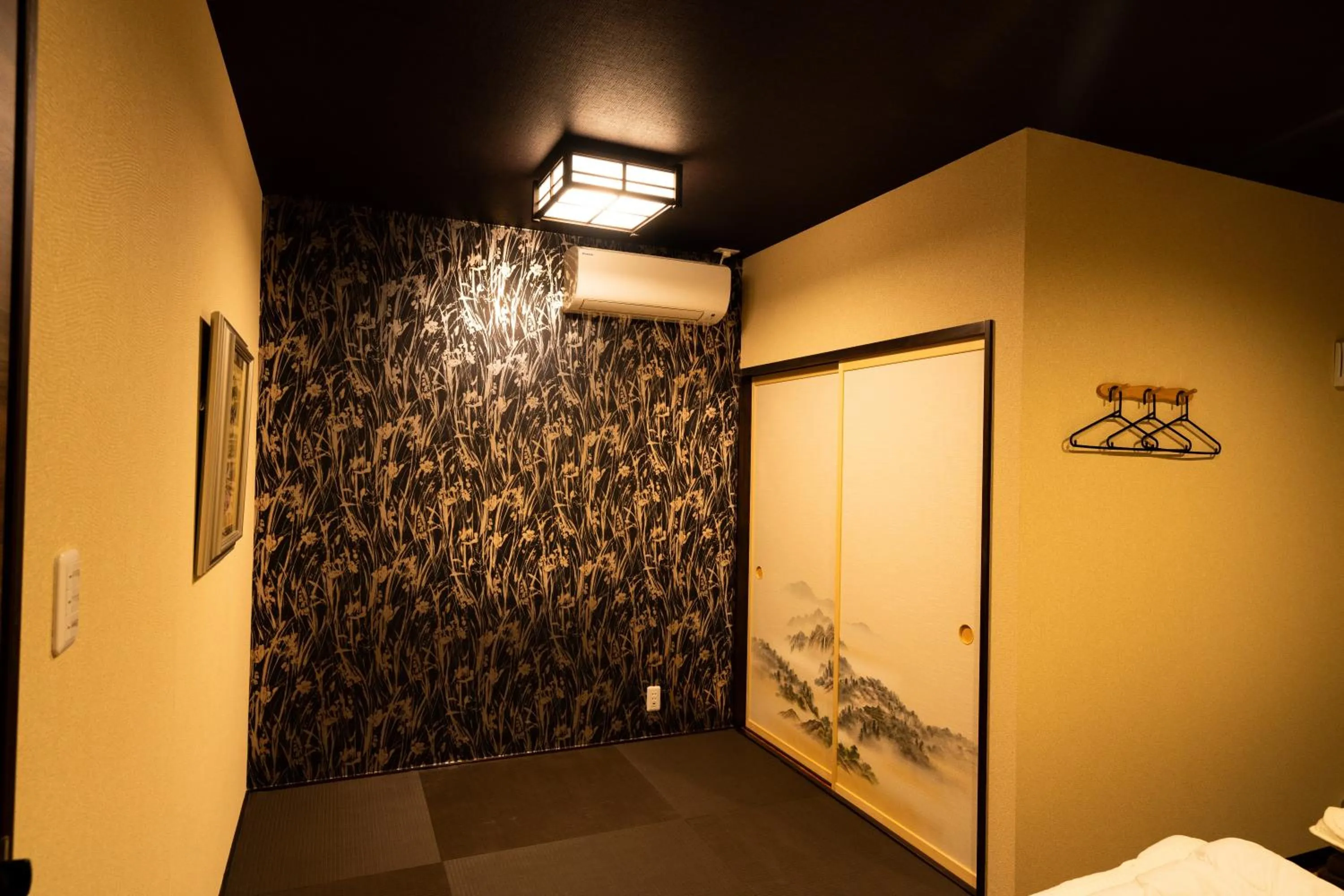 Seating area, Bed in Guest House Ouka