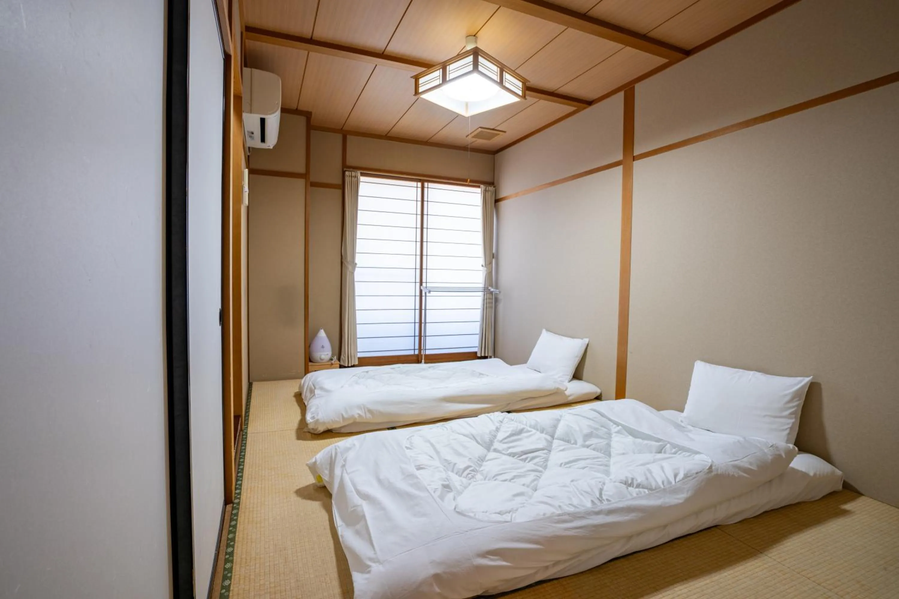 Photo of the whole room, Bed in Guest House Ouka