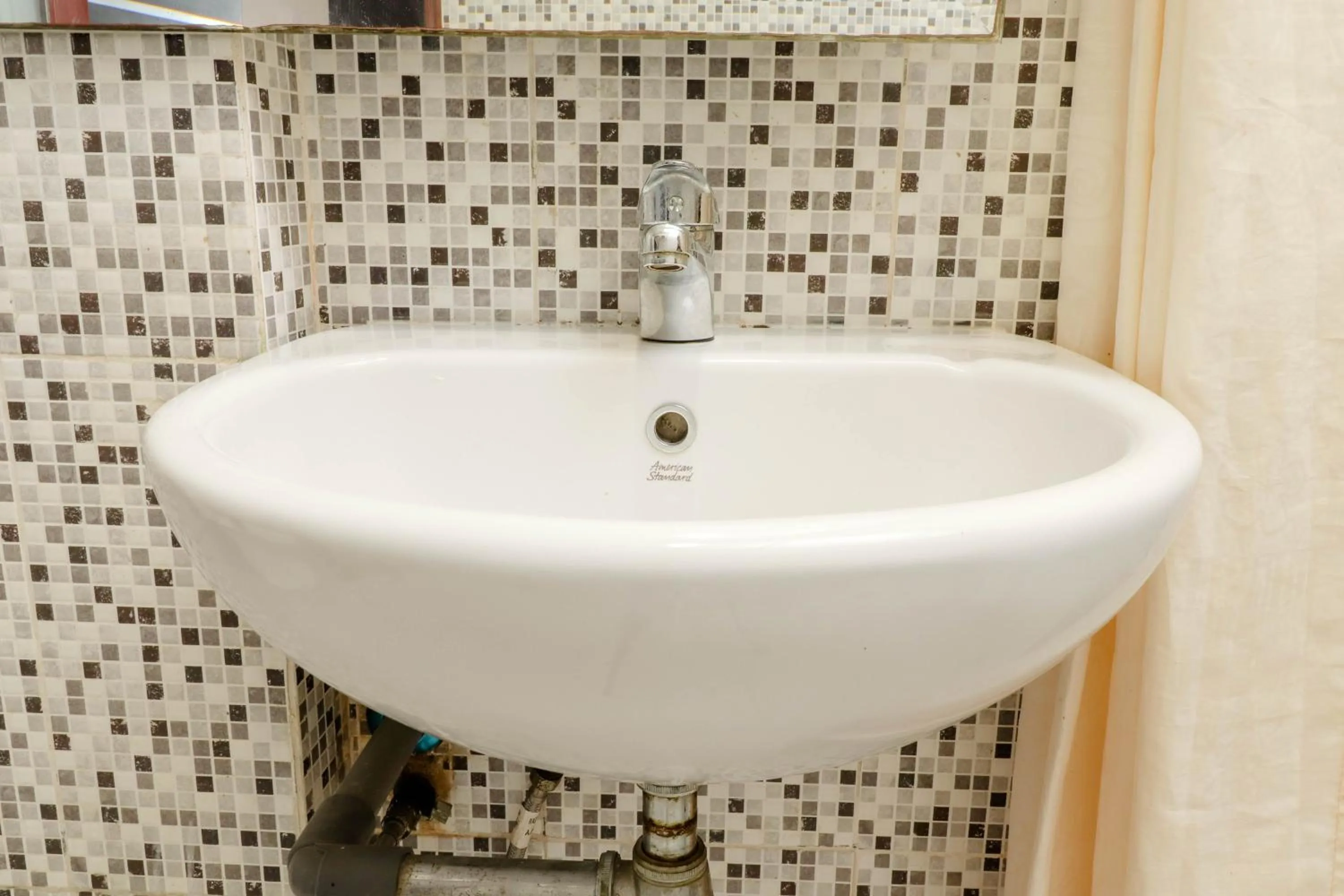 Bathroom in Blitz Hotel Batam Near Sultan Mahmud Ri'ayat Shah