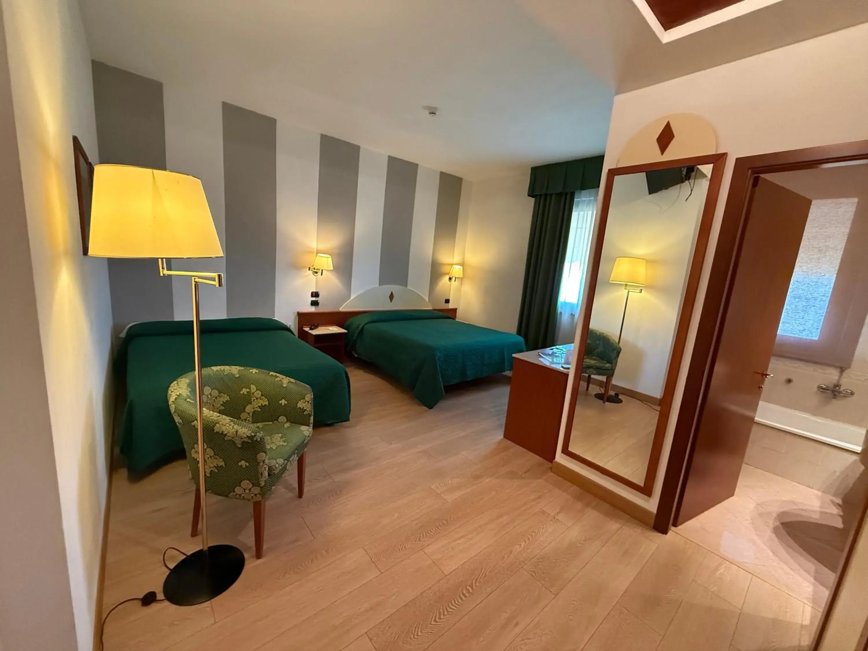 Triple Room in Hotel Le Ville Triple Room in Hotel Le Ville