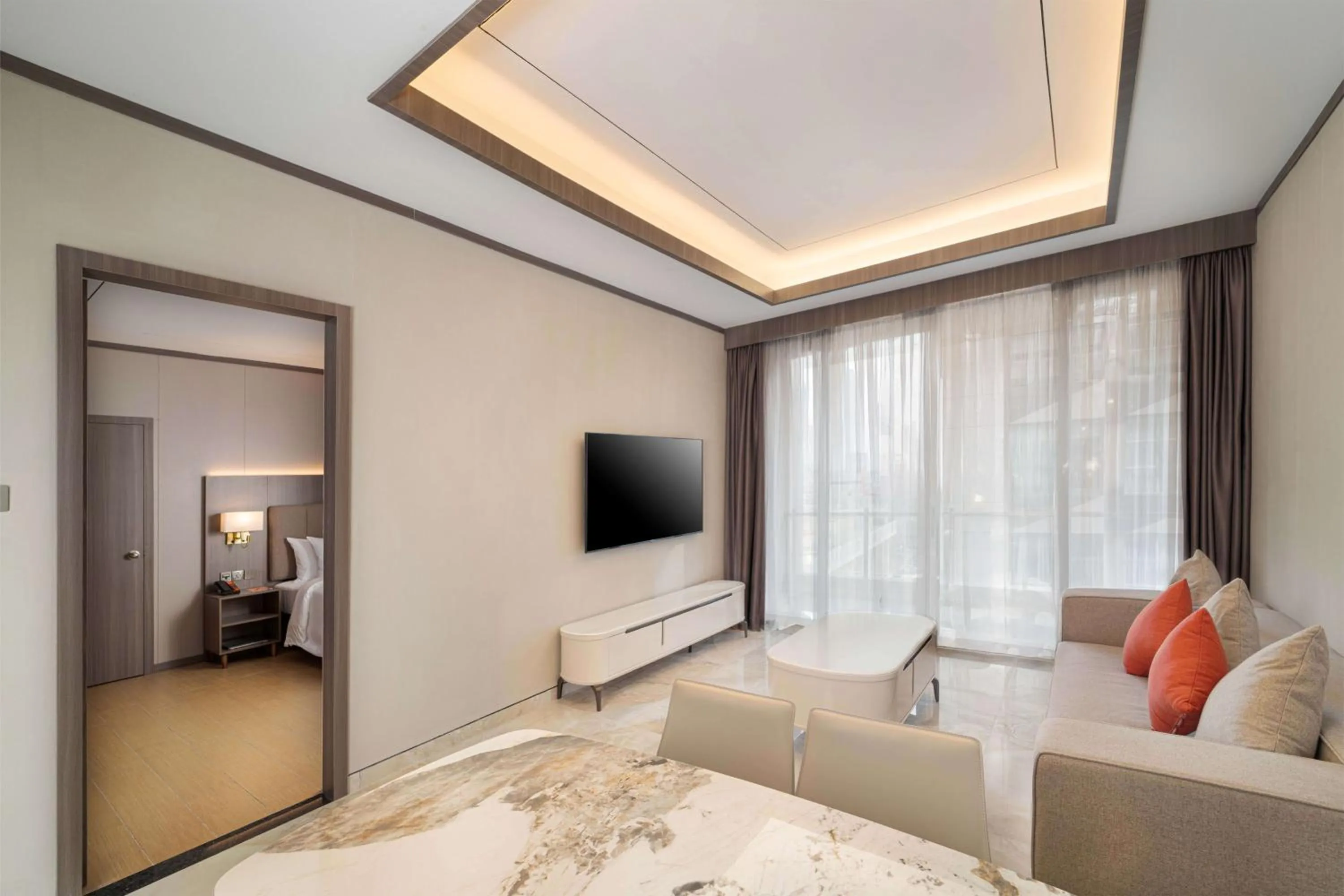 Living room, Bed in HARRIS Hotel & Suites Nagoya Batam