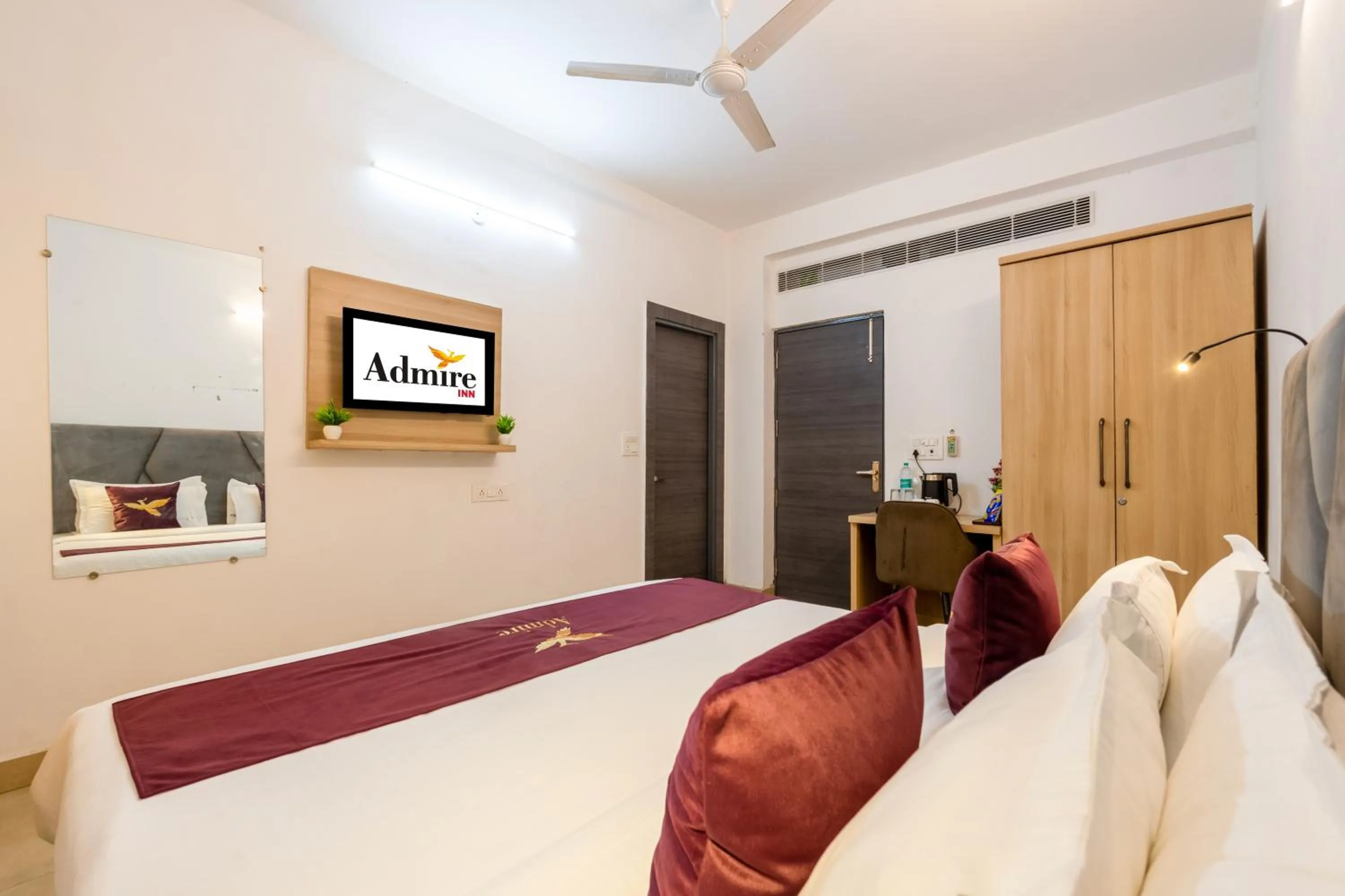 Communal lounge/ TV room, Bed in Hotel Admire Inn Sec - 104 By ASPL