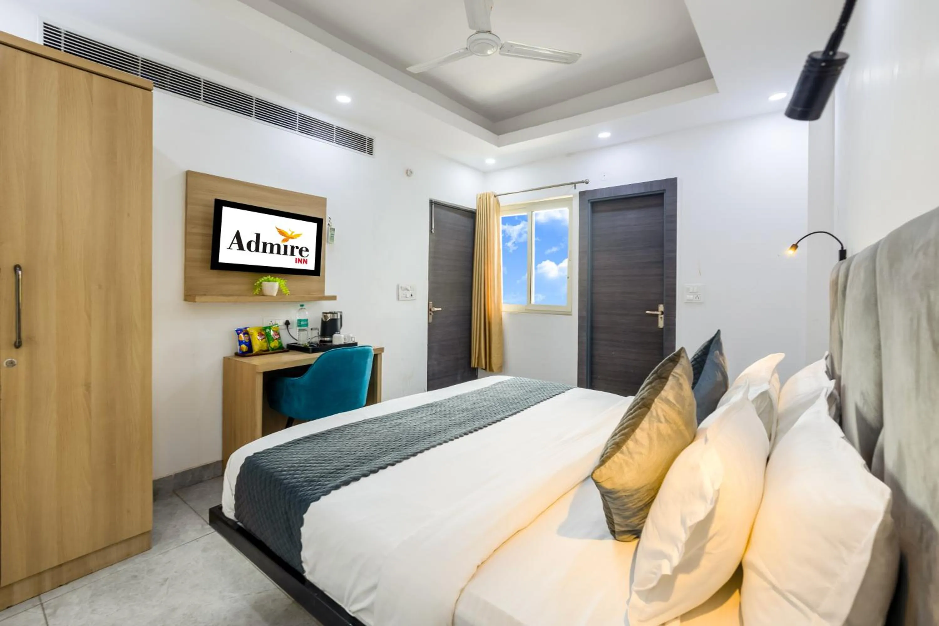 Communal lounge/ TV room, Bed in Hotel Admire Inn Sec - 104 By ASPL