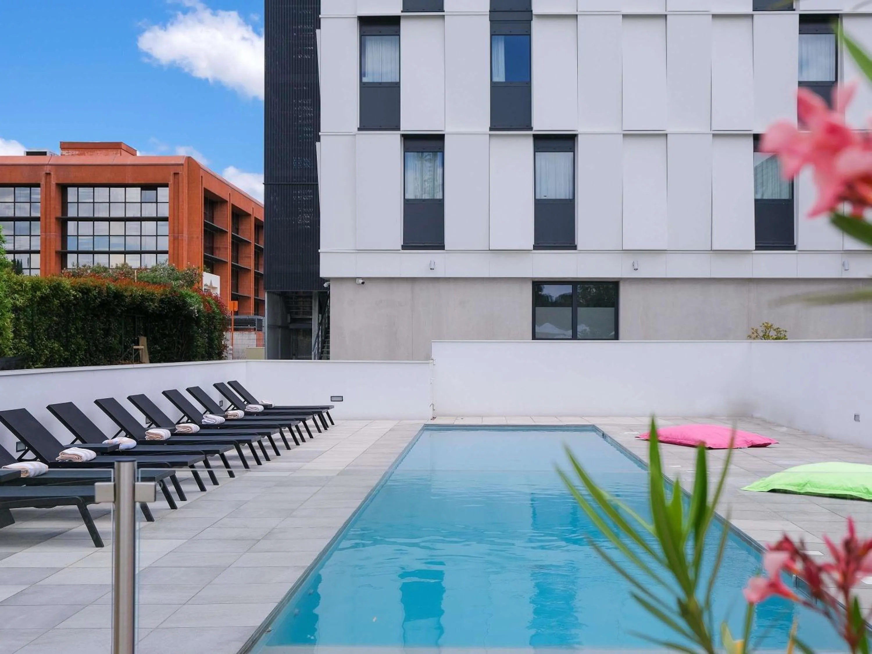 Pool view in Ibis Styles Toulouse Labège