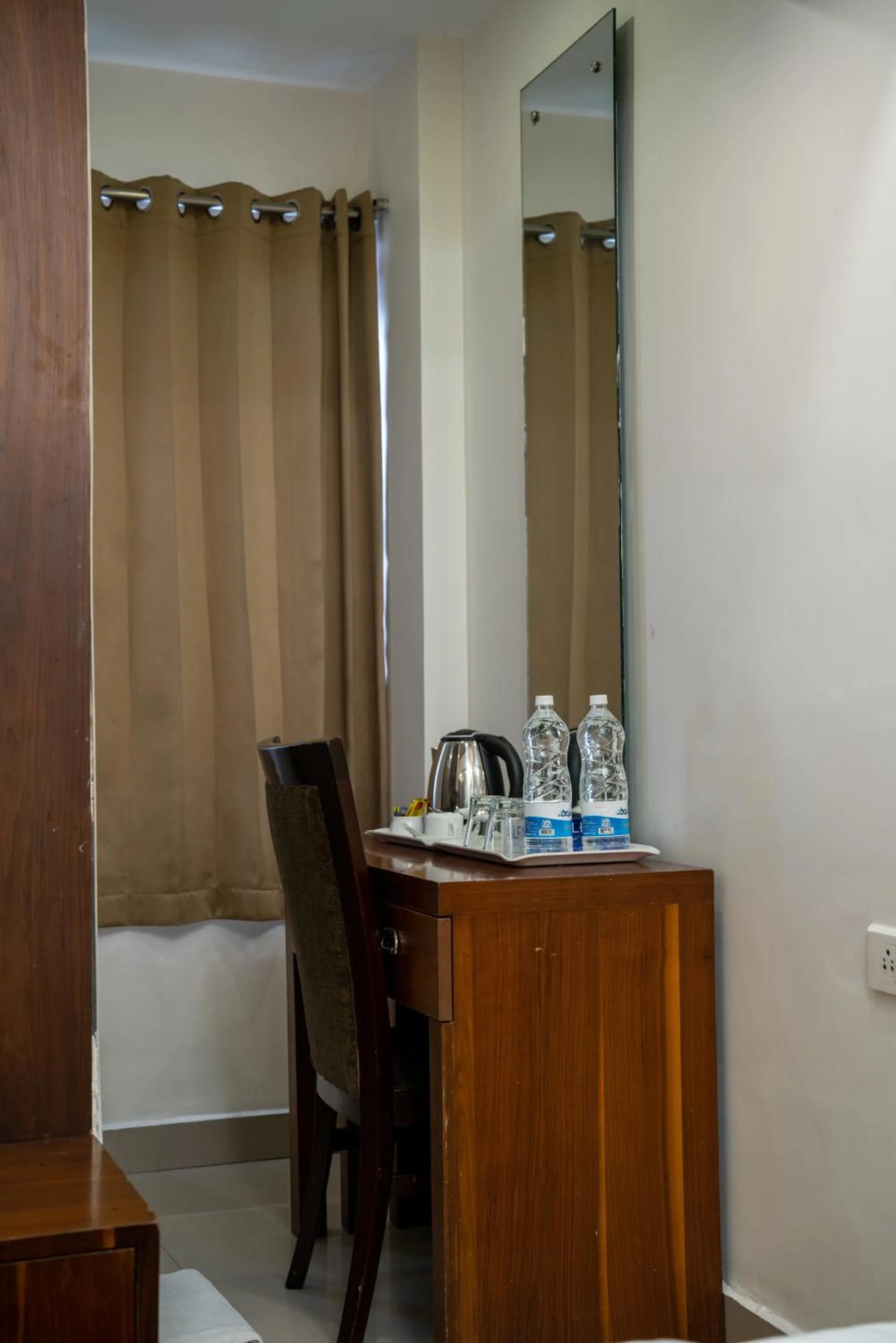 Bedroom in Royal Plaza Glitz Inn