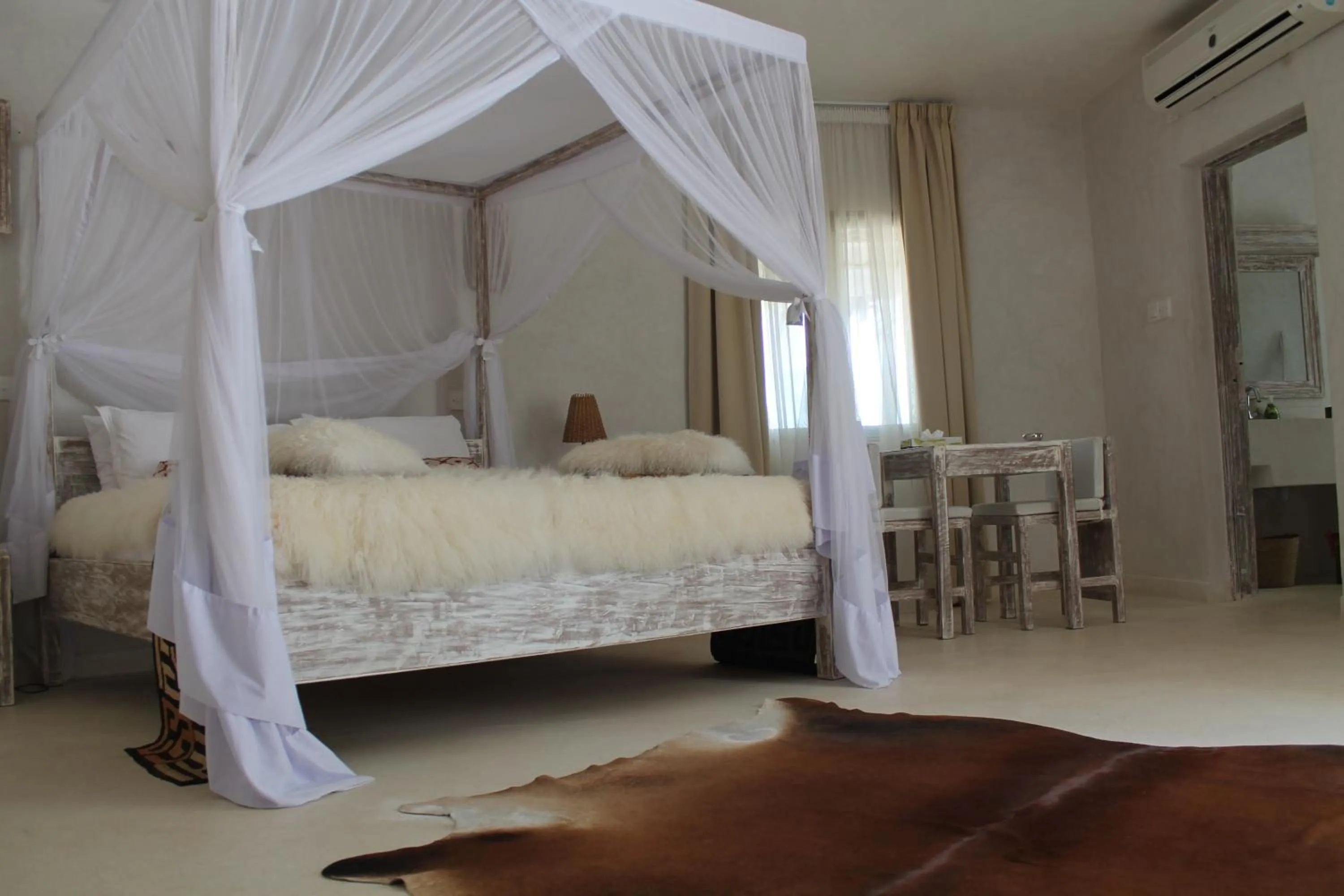 Day, Bed in The Villa Luxury Suites Hotel