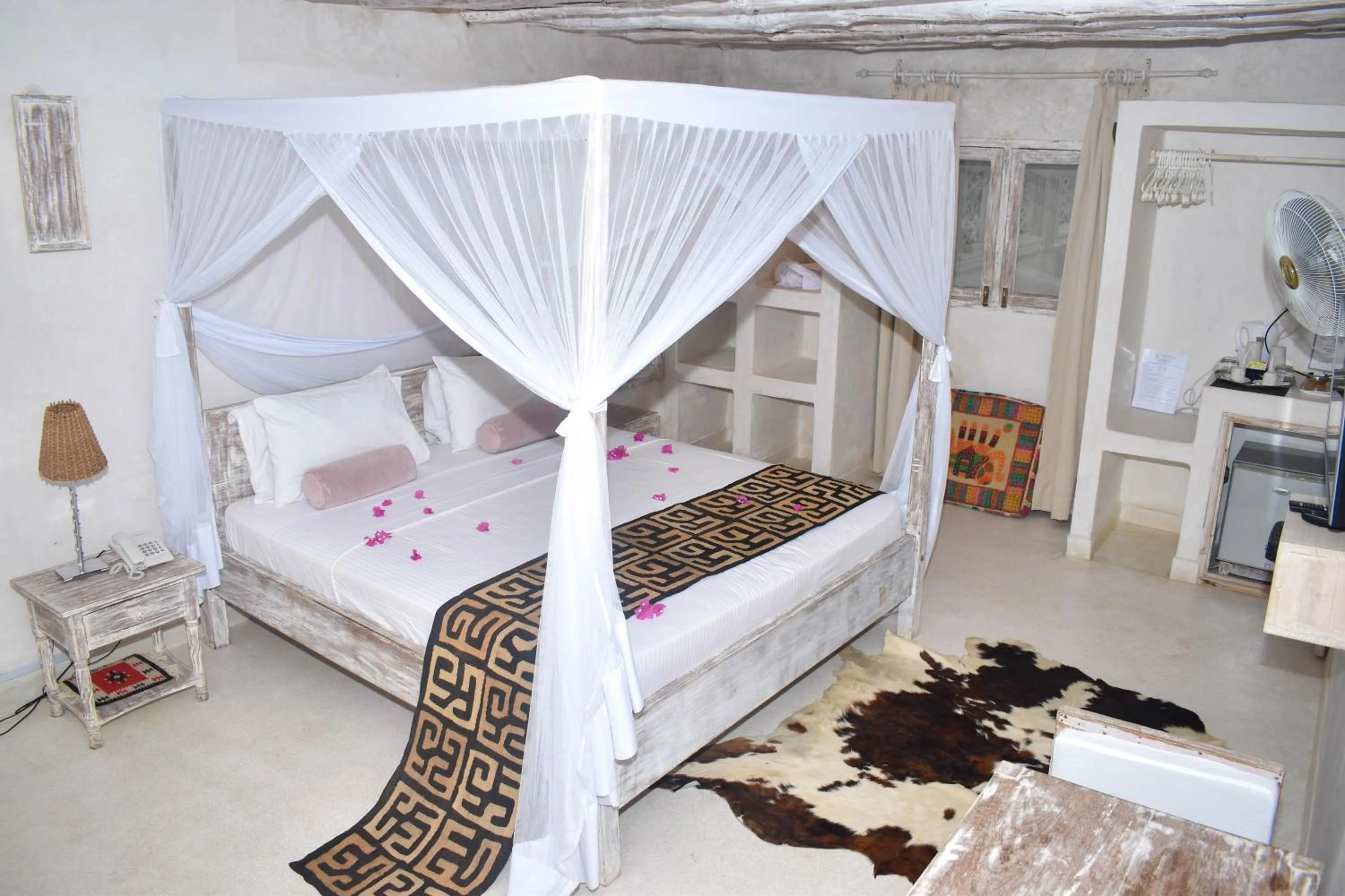 Bed in The Villa Luxury Suites Hotel
