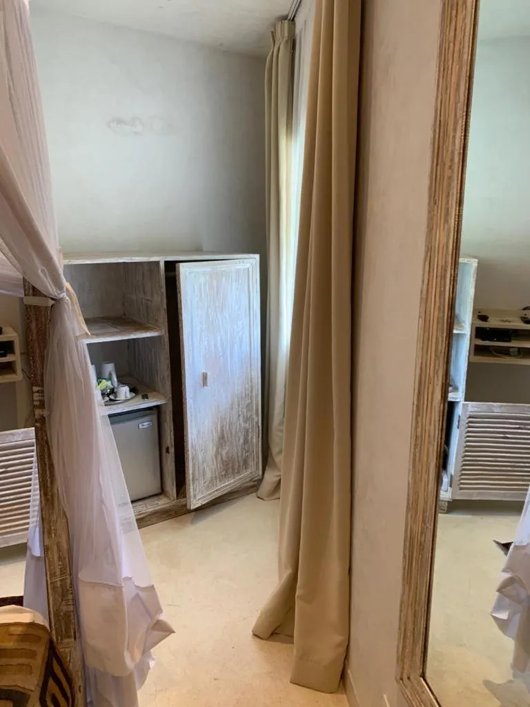 Bed in The Villa Luxury Suites Hotel