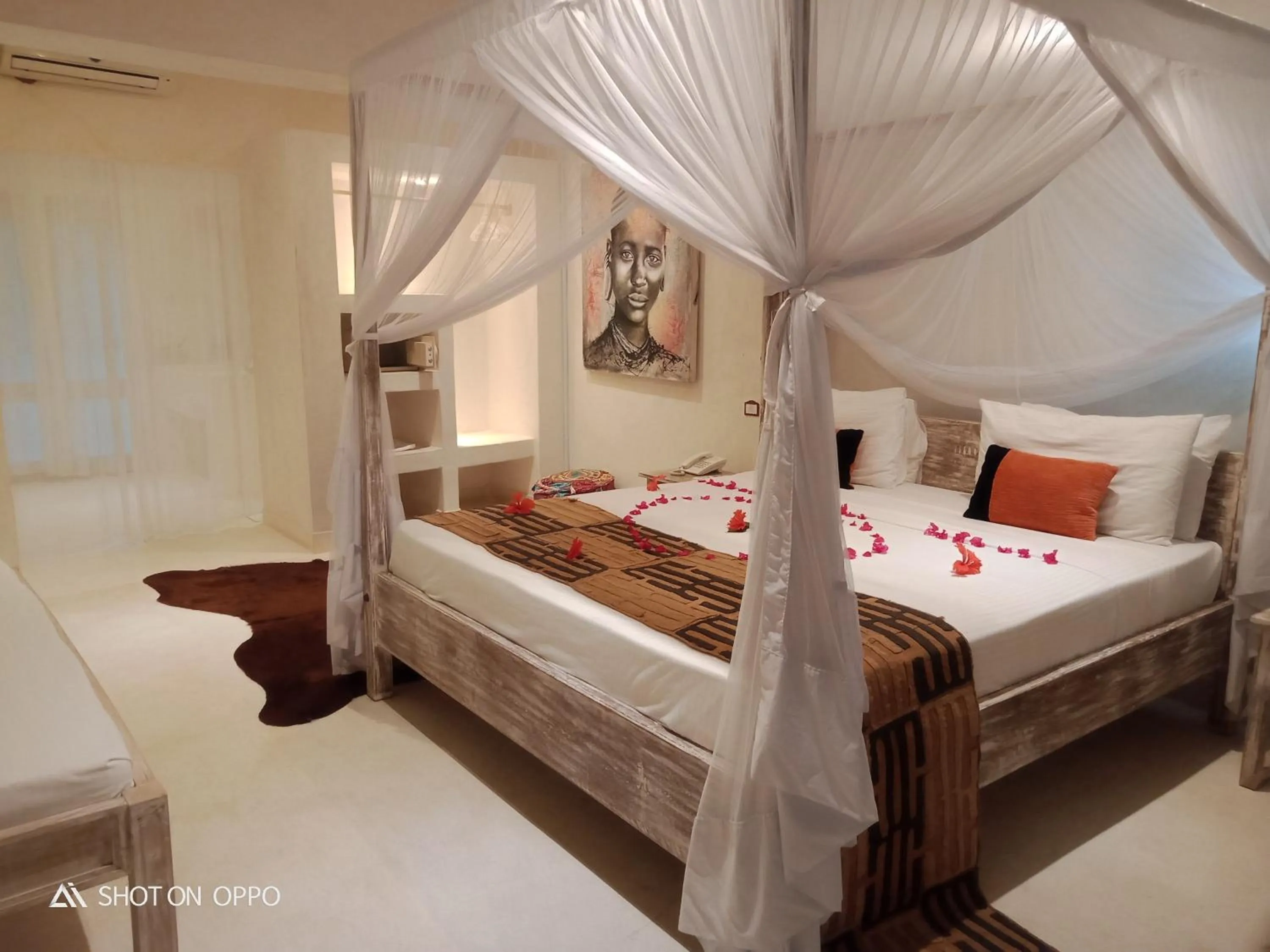 Bed in The Villa Luxury Suites Hotel