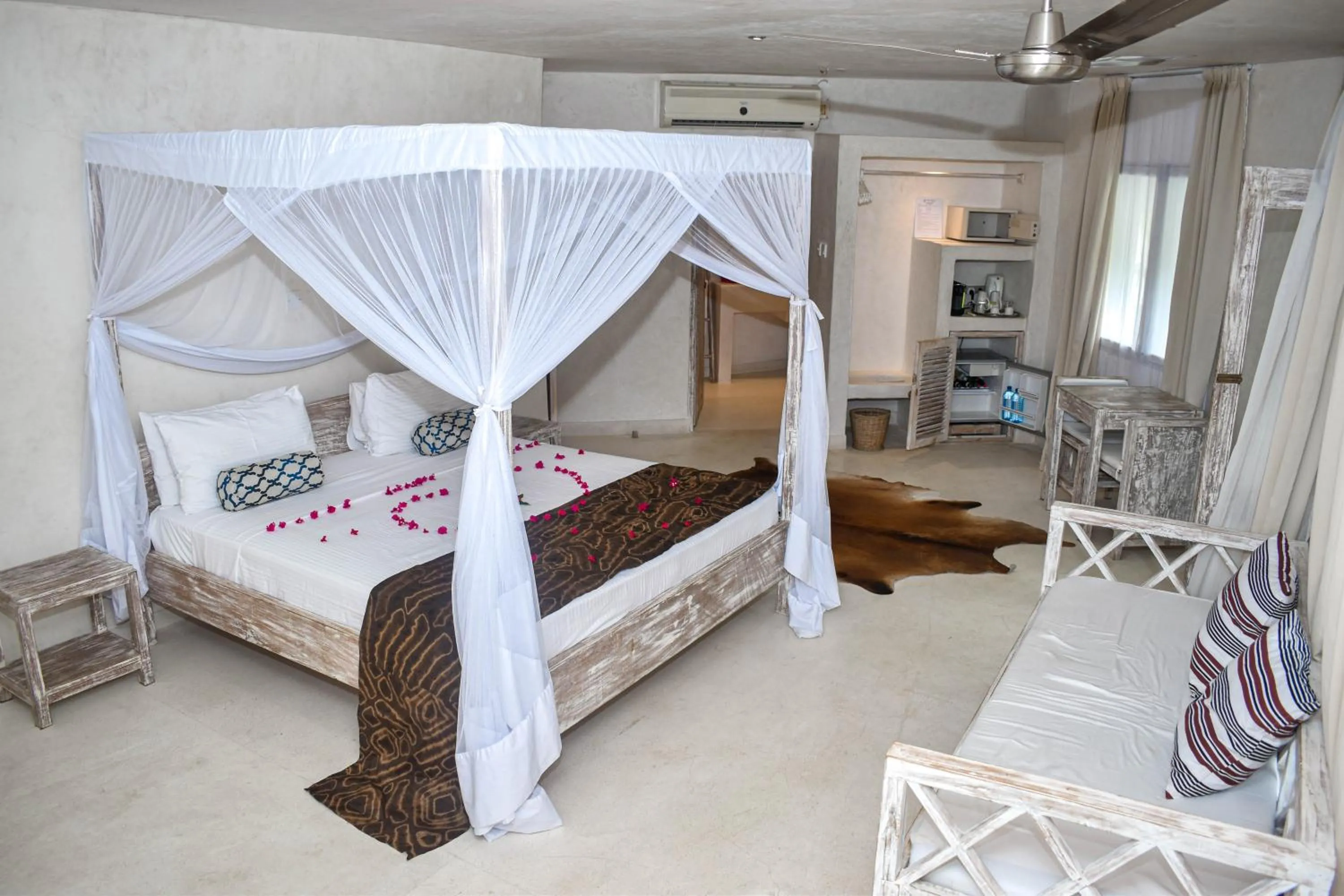 Bed in The Villa Luxury Suites Hotel
