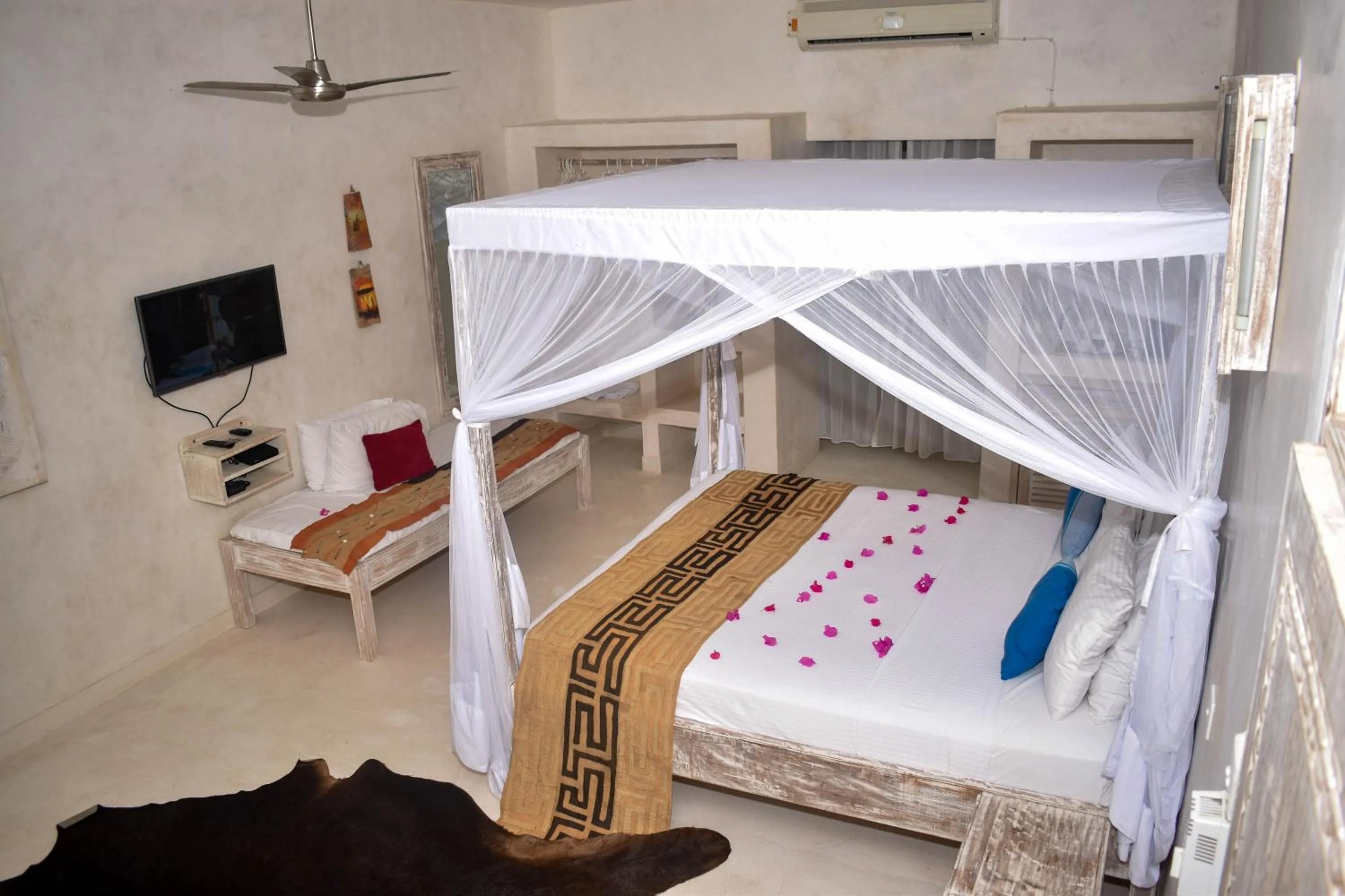 Bed in The Villa Luxury Suites Hotel