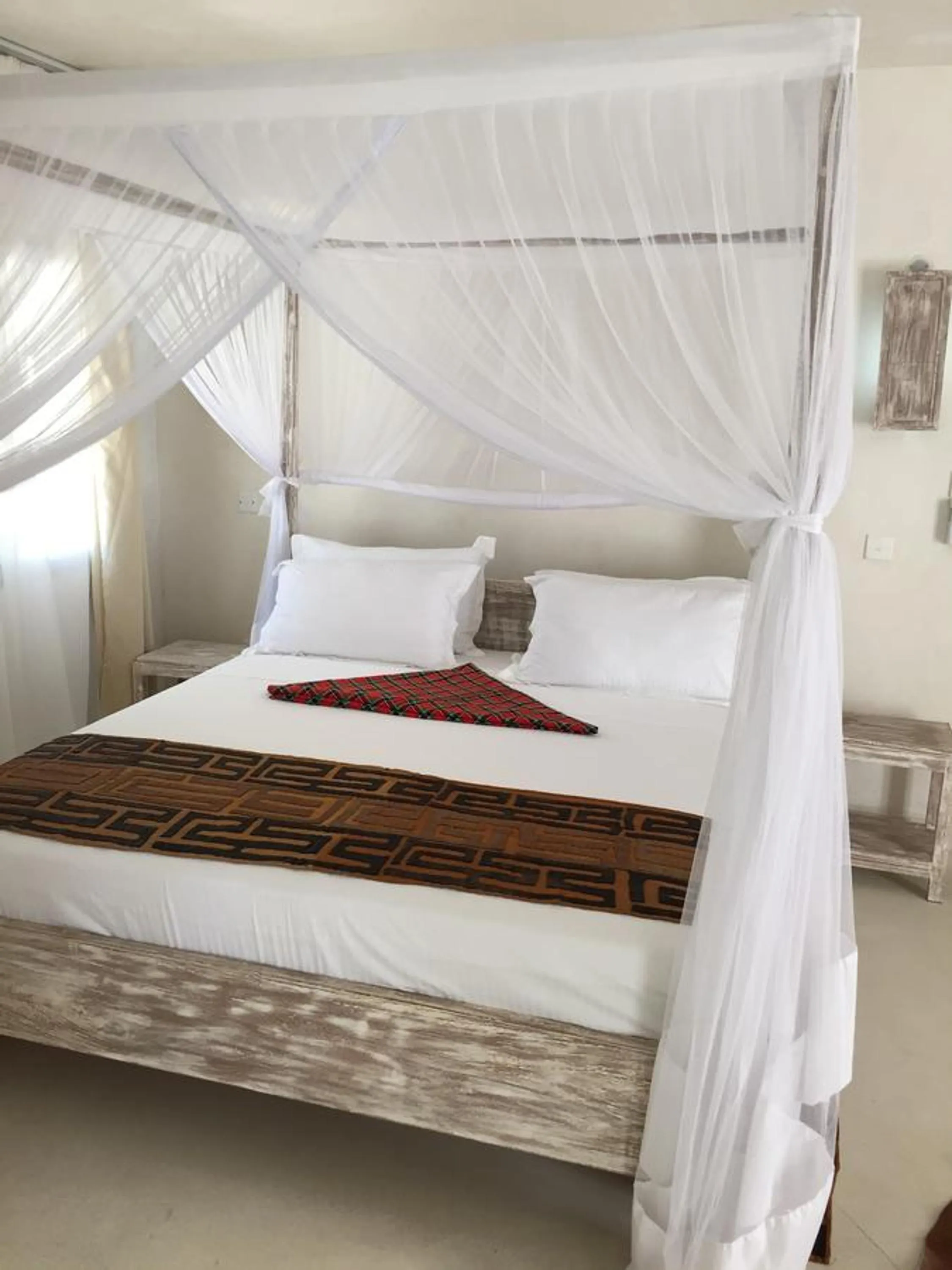 Bed in The Villa Luxury Suites Hotel