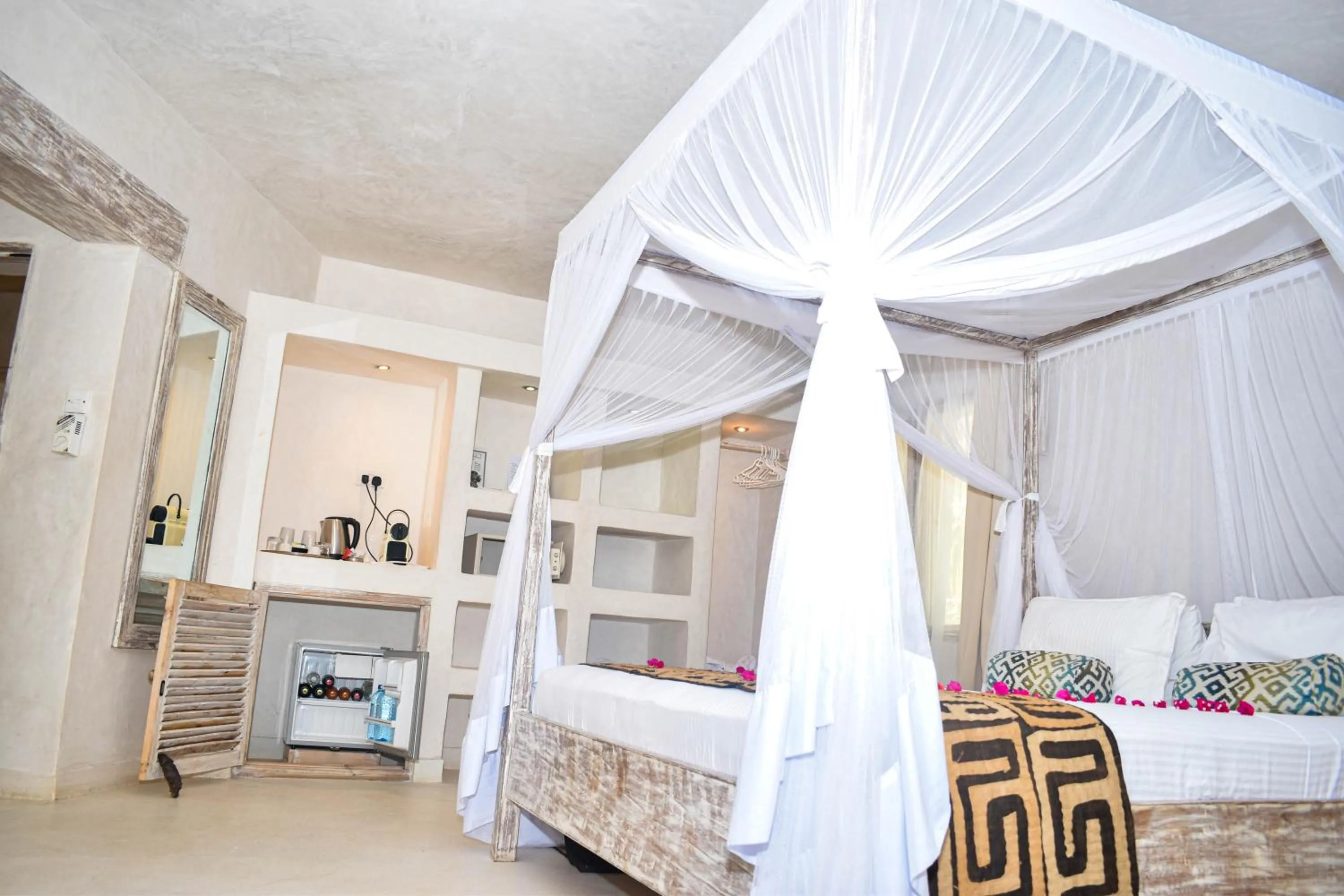 Bed in The Villa Luxury Suites Hotel
