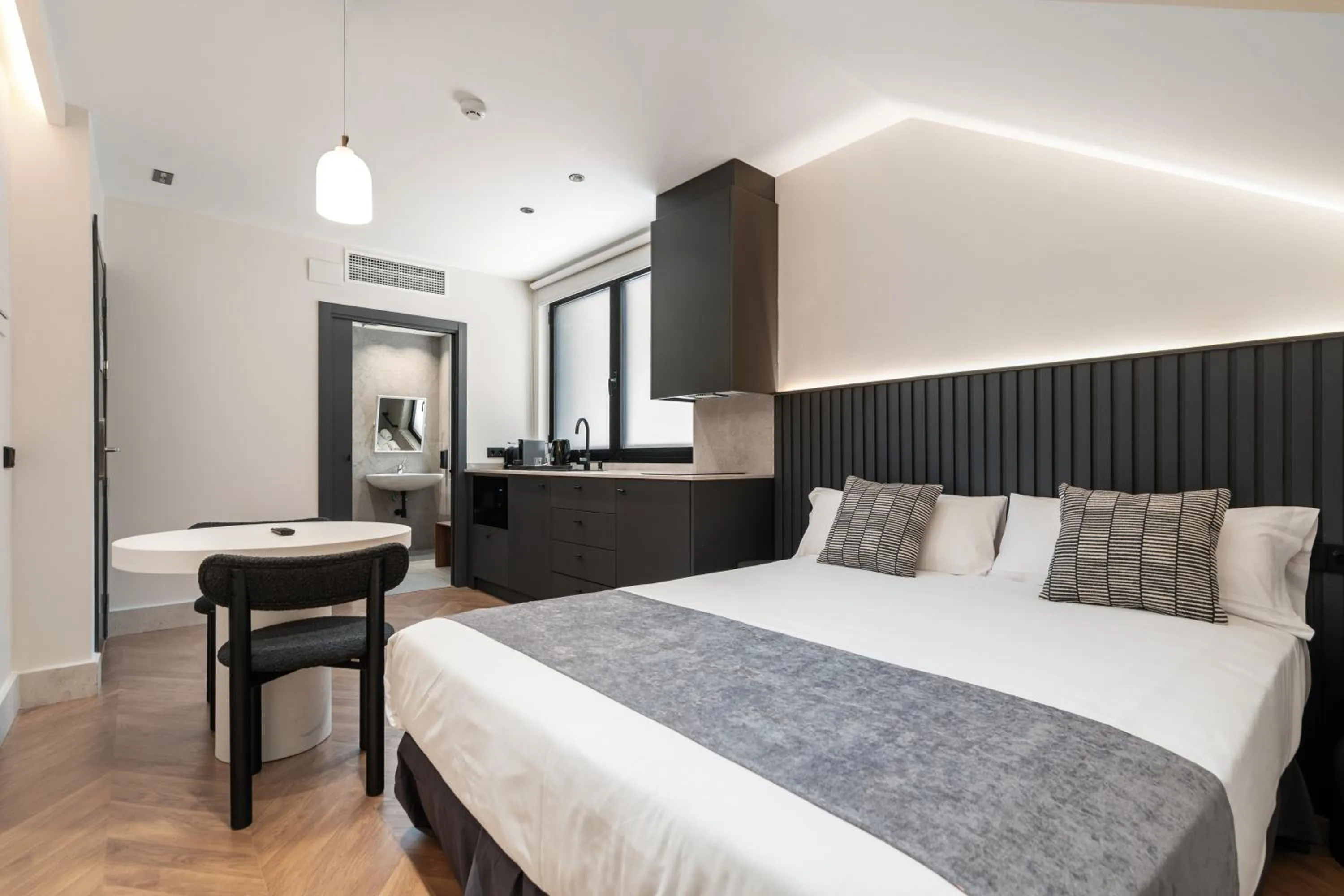 Bed in Pacifico Suites near Retiro