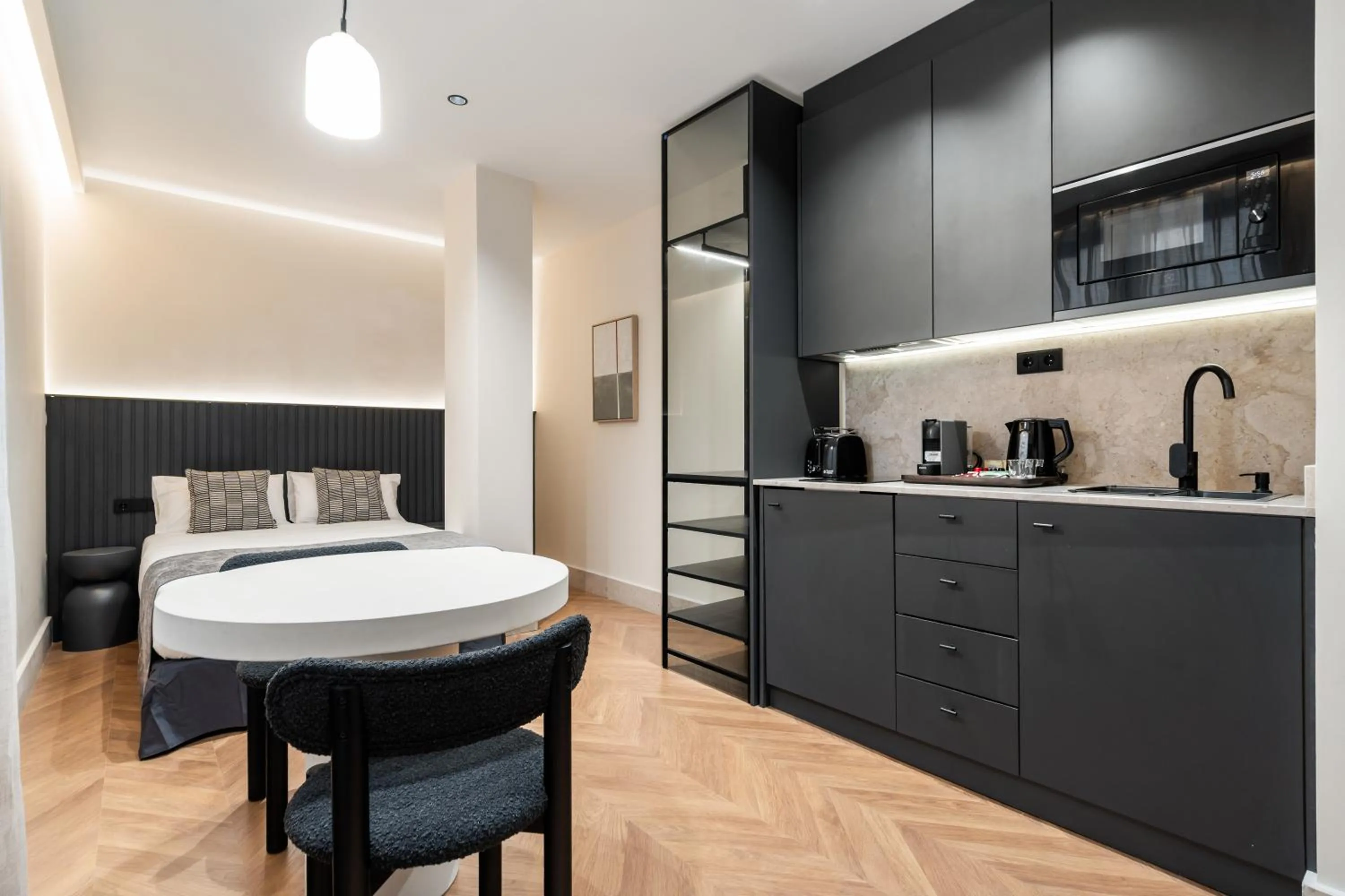 Bed in Pacifico Suites near Retiro