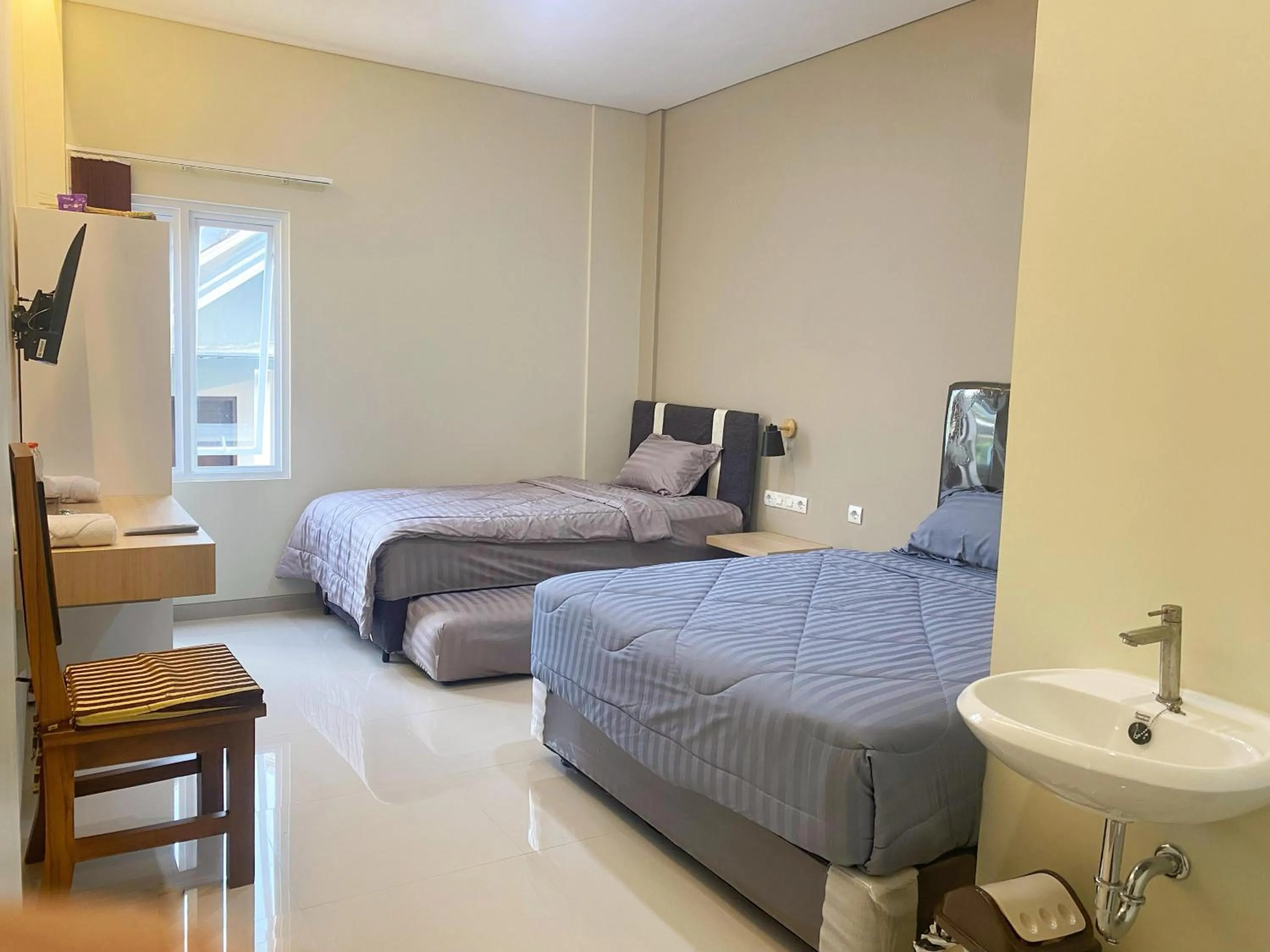 Bed in Nganjuk Family Guest House