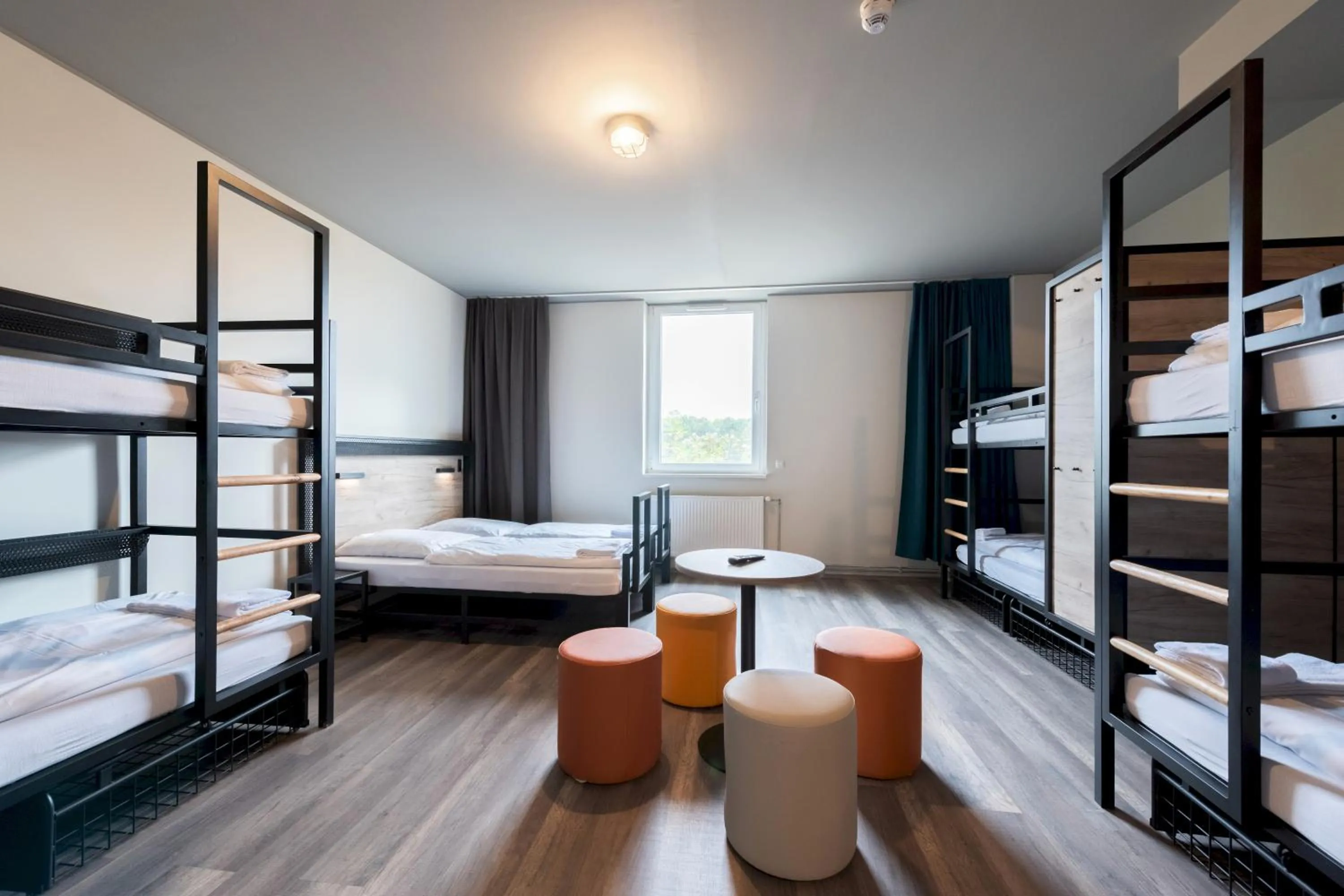 Photo of the whole room, Bed in a&o Stuttgart City