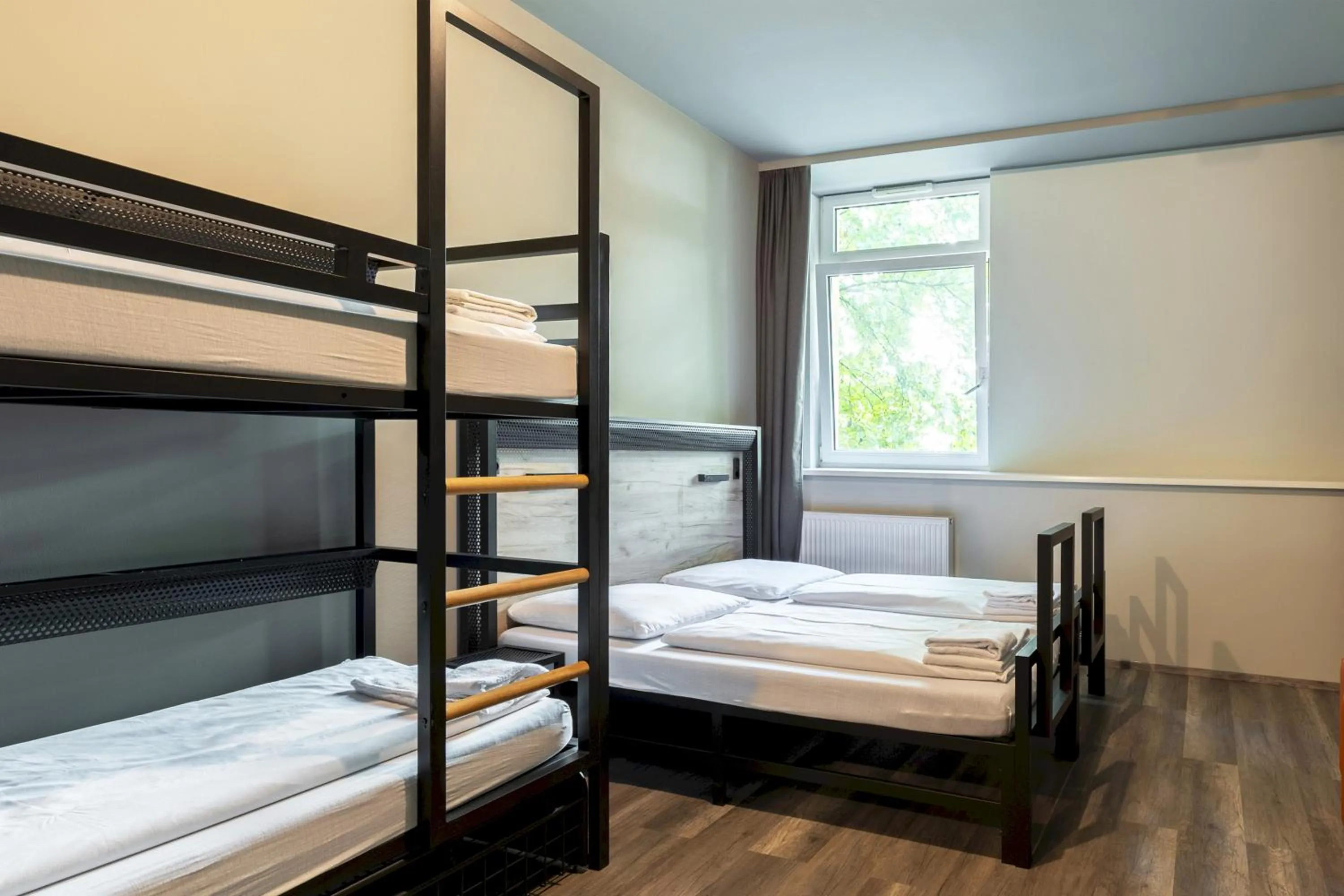 Photo of the whole room, Bed in a&o Stuttgart City