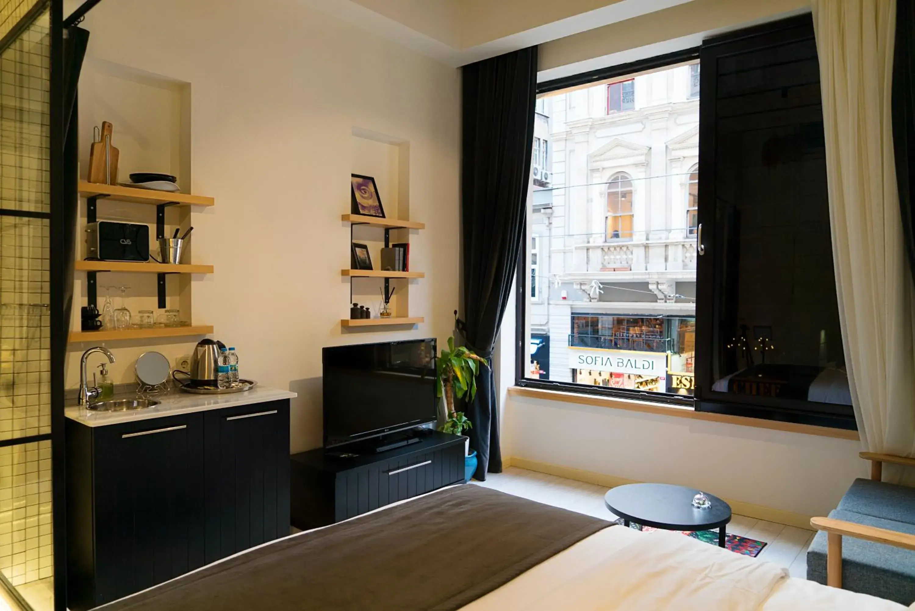 Photo of the whole room, Bed in Magnova Studios Photo of the whole room, Bed in Magnova Studios