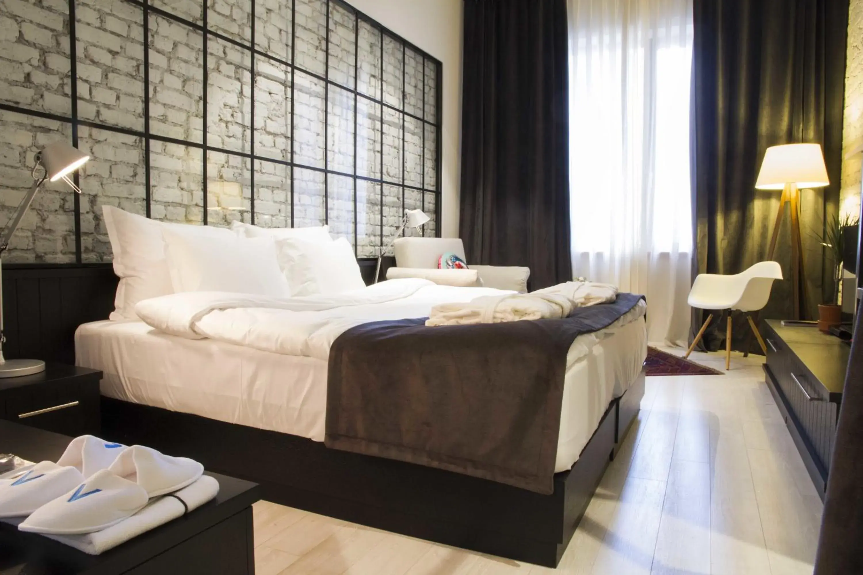 Photo of the whole room, Bed in Magnova Studios Photo of the whole room, Bed in Magnova Studios